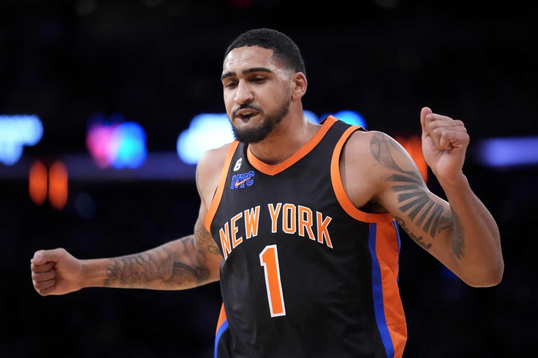 New York Knicks forward Obi Toppin (1) reacts after scoring during the second half of an NBA basketball game against the Philadelphia 76ers, Sunday, Feb. 5, 2023, in New York. (AP Photo/John Minchillo)