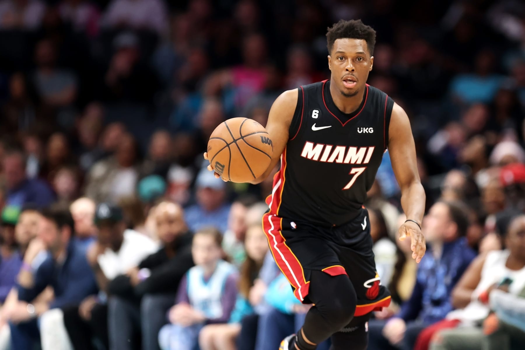 CHARLOTTE, NORTH CAROLINA - JANUARY 29: Kyle Lowry #7 of the Miami Heat brings the ball down the court during the fourth quarter of a basketball game against the Charlotte Hornets at Spectrum Center on January 29, 2023 in Charlotte, North Carolina. NOTE TO USER: User expressly acknowledges and agrees that, by downloading and or using this photograph, User is consenting to the terms and conditions of the Getty Images License Agreement. (Photo by David Jensen/Getty Images)