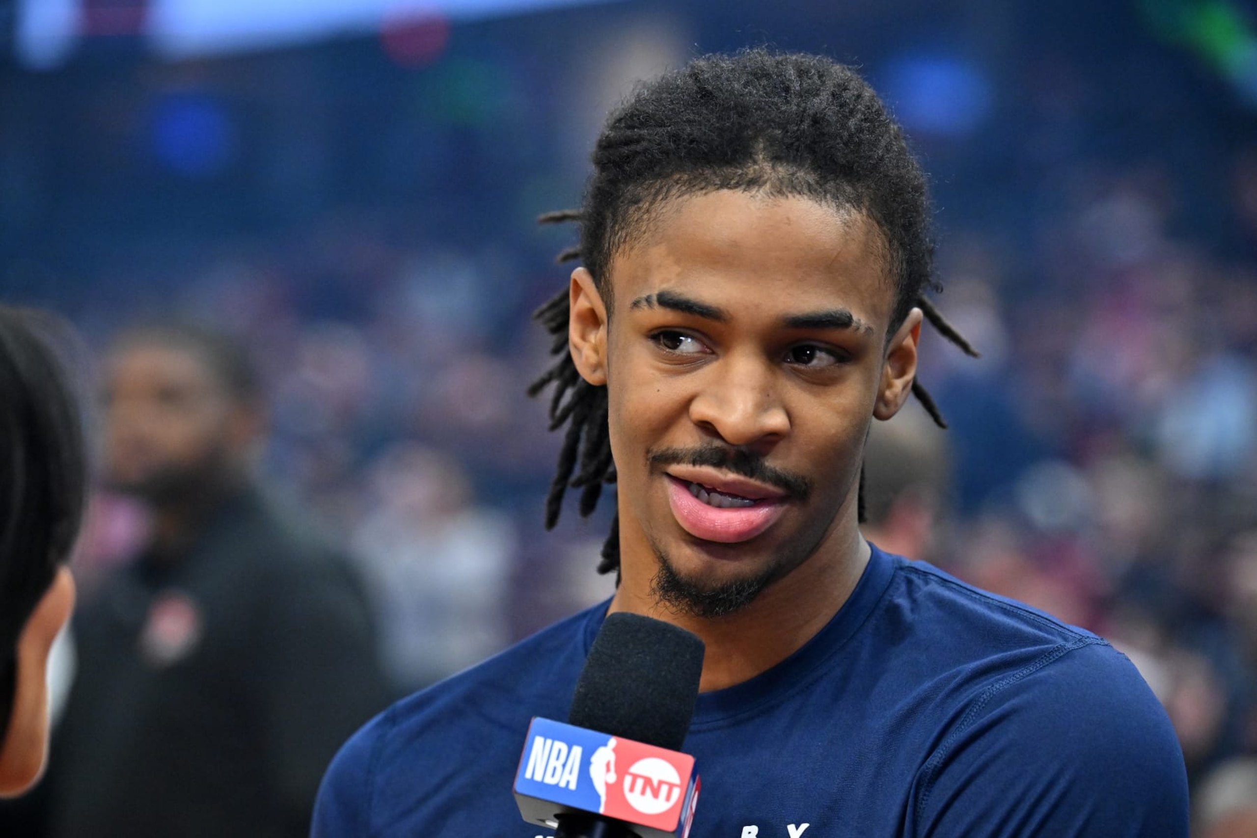 CLEVELAND, OHIO - FEBRUARY 02: Ja Morant #12 of the Memphis Grizzlies conducts a TV interview prior to the game against the Cleveland Cavaliers at Rocket Mortgage Fieldhouse on February 02, 2023 in Cleveland, Ohio. NOTE TO USER: User expressly acknowledges and agrees that, by downloading and or using this photograph, User is consenting to the terms and conditions of the Getty Images License Agreement. (Photo by Jason Miller/Getty Images)