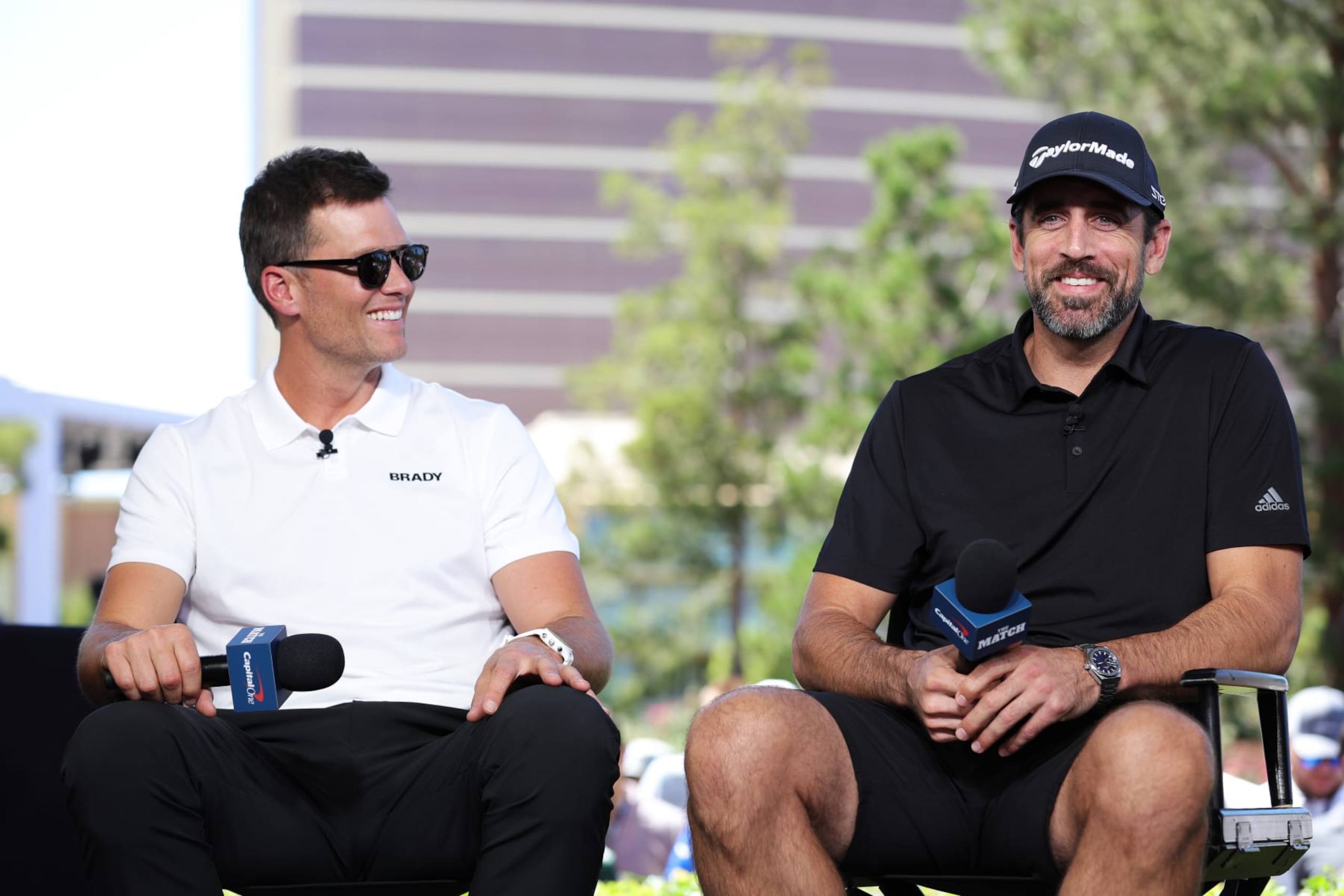 LAS VEGAS, NEVADA - JUNE 01: Tom Brady and Aaron Rodgers take part in the Bleacher Report Hot Seat Press Conference prior to Capital One's The Match VI - Brady & Rodgers v Allen & Mahomes at Wynn Golf Club on June 01, 2022 in Las Vegas, Nevada. (Photo by Carmen Mandato/Getty Images for The Match) LAS VEGAS, NEVADA - JUNE 01: Tom Brady and Aaron Rodgers take part in the Bleacher Report Hot Seat Press Conference prior to Capital One's The Match VI - Brady & Rodgers v Allen & Mahomes at Wynn Golf Club on June 01, 2022 in Las Vegas, Nevada. (Photo by Carmen Mandato/Getty Images for The Match)