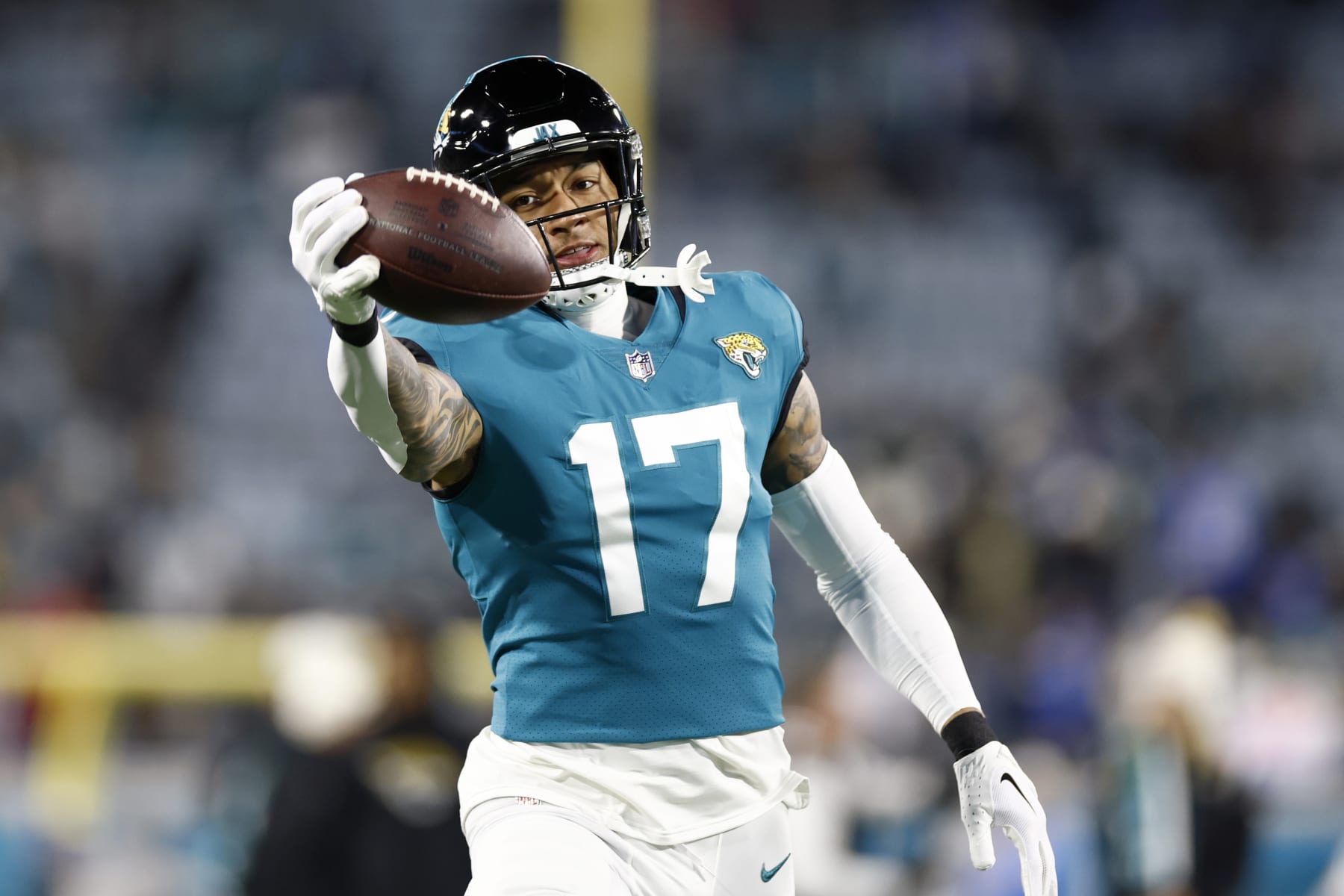 JACKSONVILLE, FLORIDA - JANUARY 14: Evan Engram #17 of the Jacksonville Jaguars warms up prior to a game against the Los Angeles Chargers in the AFC Wild Card playoff game at TIAA Bank Field on January 14, 2023 in Jacksonville, Florida. (Photo by Douglas P. DeFelice/Getty Images)