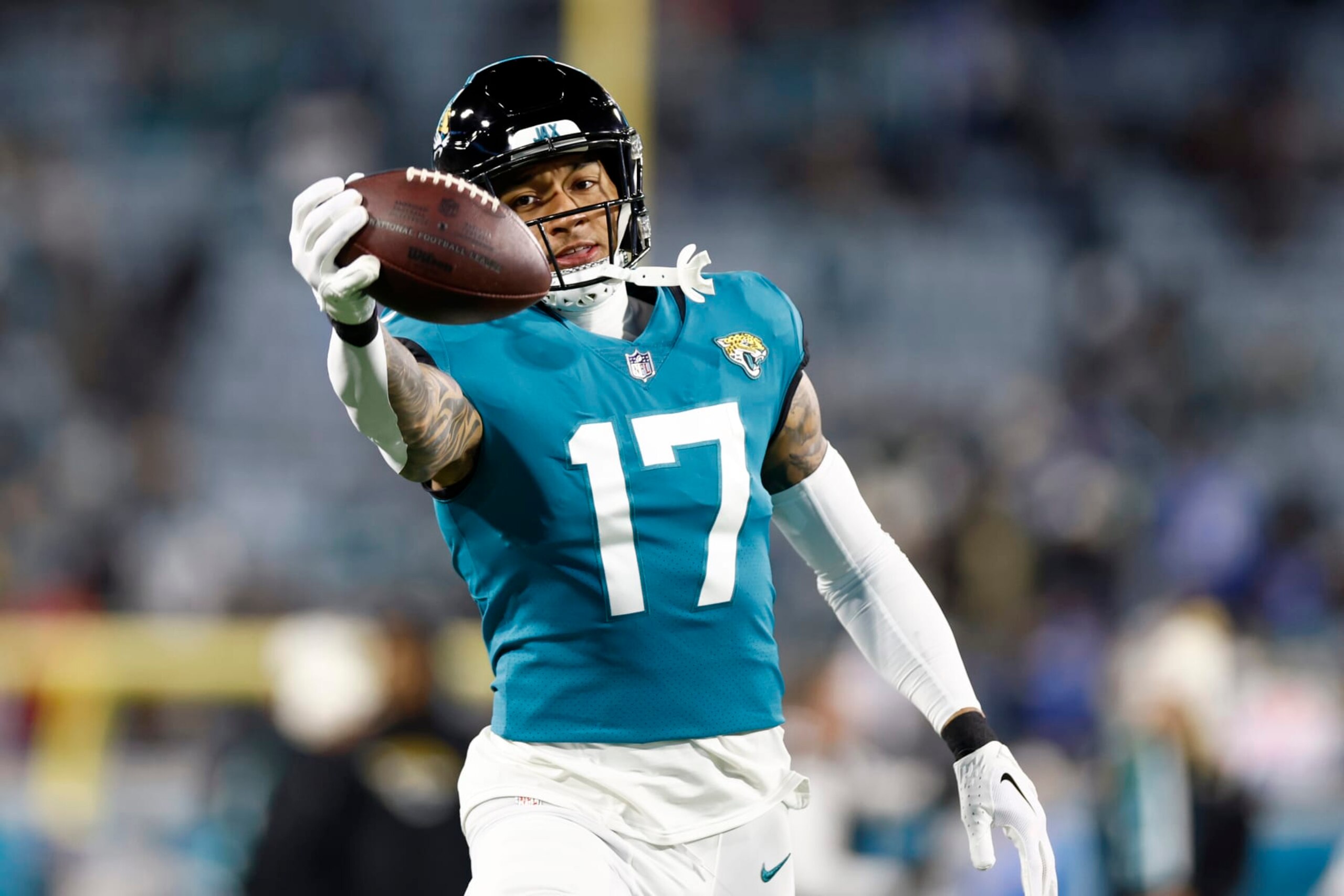 JACKSONVILLE, FLORIDA - JANUARY 14: Evan Engram #17 of the Jacksonville Jaguars warms up prior to a game against the Los Angeles Chargers in the AFC Wild Card playoff game at TIAA Bank Field on January 14, 2023 in Jacksonville, Florida. (Photo by Douglas P. DeFelice/Getty Images)