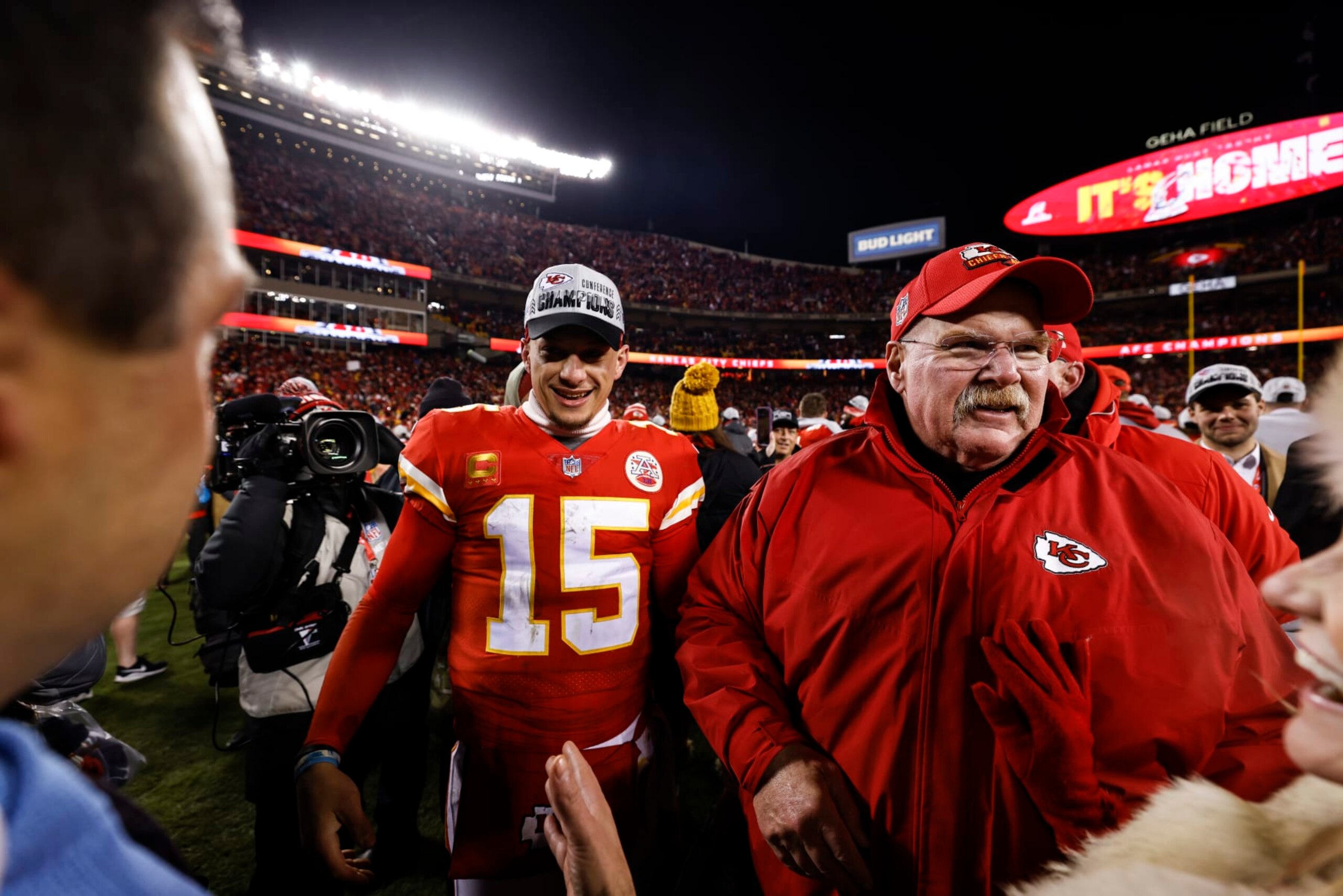 KANSAS CITY, MISSOURI - JANUARY 29: Patrick Mahomes #15 of the Kansas City Chiefs celebrates with head coach Andy Reid after defeating the Cincinnati Bengals in the AFC Championship NFL football game at GEHA Field at Arrowhead Stadium on January 29, 2023 in Kansas City, Missouri. (Photo by Michael Owens/Getty Images)