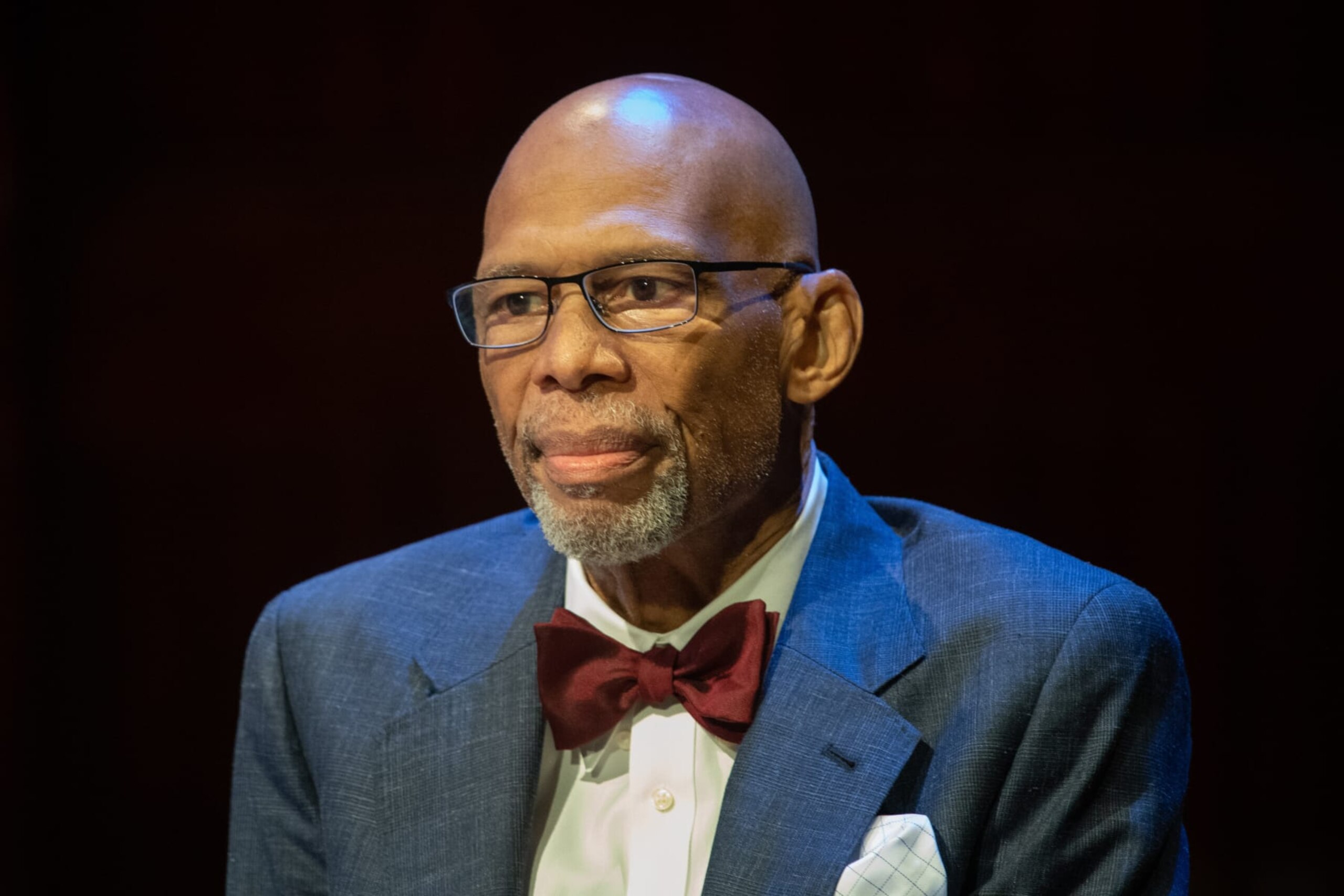 CAMBRIDGE, MA - OCTOBER 06: National Basketball Association (NBA) legend Kareem Abdul-Jabbar looks on while onstage during the Harvard University Hutchins Center Honors W.E.B. Du Bois Medal Ceremony on October 6, 2022, at Sanders Theatre in Cambridge, MA. (Photo by Erica Denhoff/Icon Sportswire via Getty Images)
