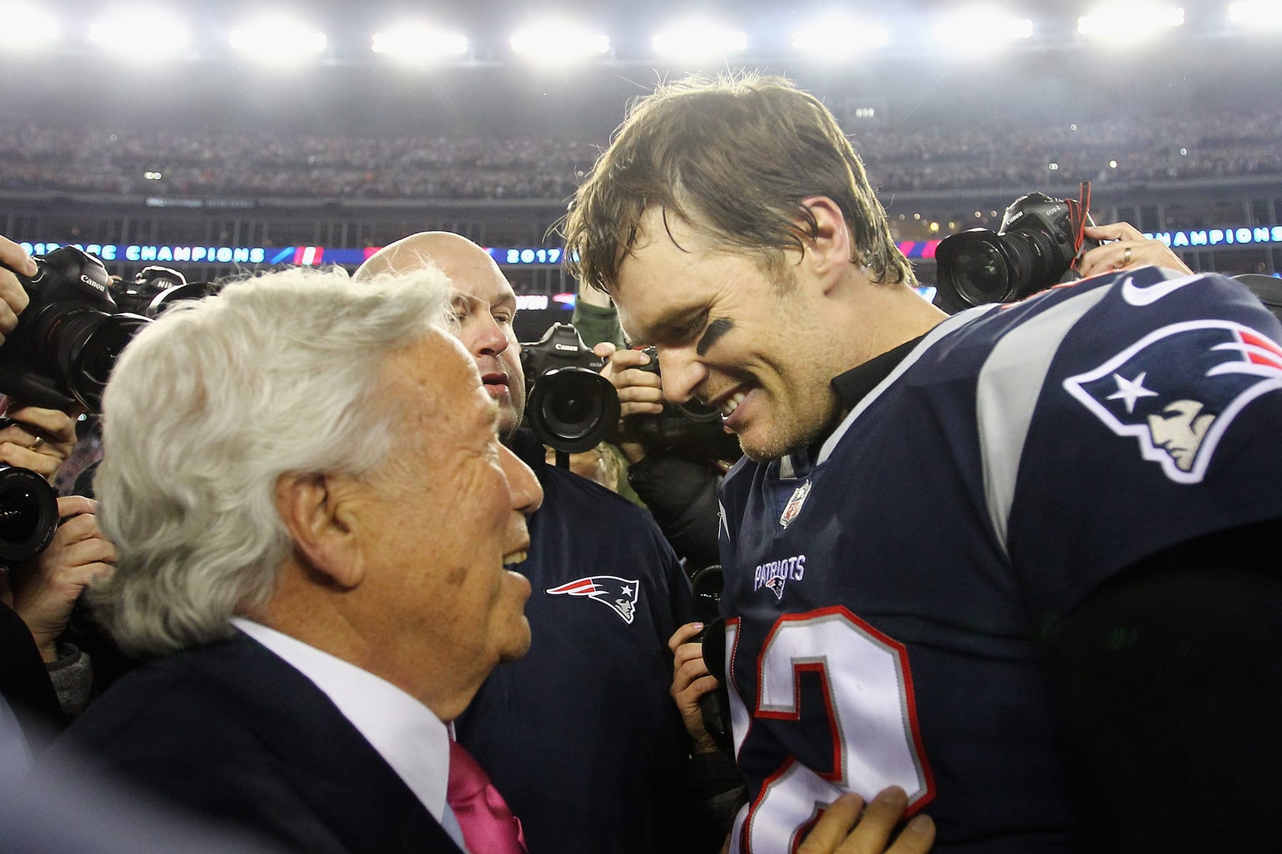 FOXBOROUGH, MA - JANUARY 21:  Tom Brady #12 of the New England Patriots celebrates with owner Robert Kraft after winning the AFC Championship Game against the Jacksonville Jaguars at Gillette Stadium on January 21, 2018 in Foxborough, Massachusetts.  (Photo by Jim Rogash/Getty Images)