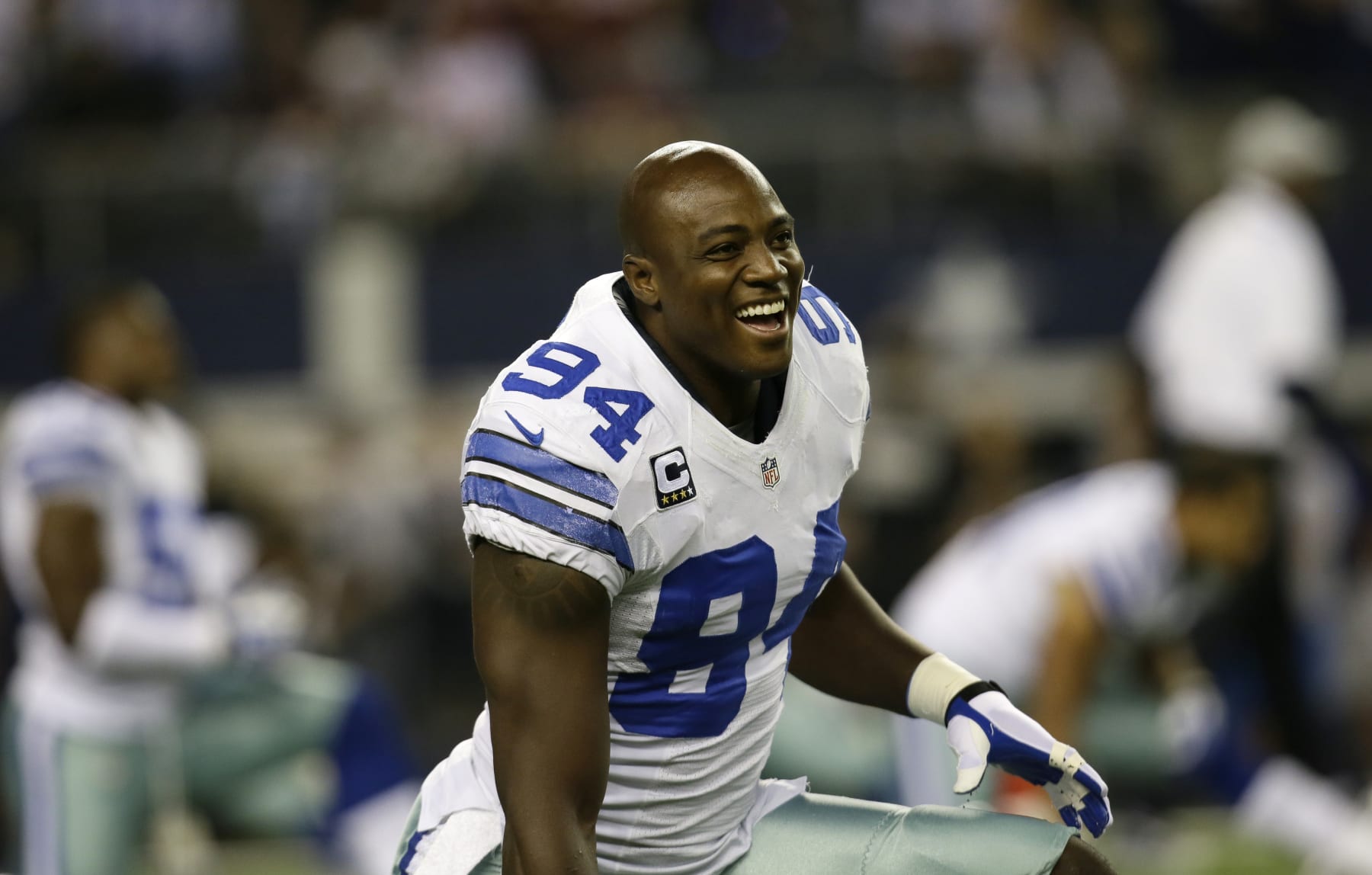 Dallas Cowboys defensive end DeMarcus Ware (94) warms up before an NFL football game against the Washington Redskins Sunday, Oct. 13, 2013, in Arlington, Texas. (AP Photo/Tim Sharp)