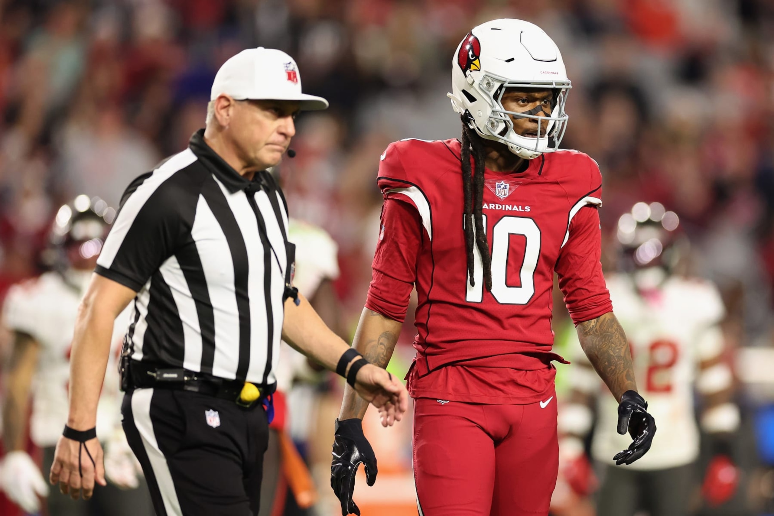GLENDALE, ARIZONA - DECEMBER 25: Wide receiver DeAndre Hopkins #10 of the Arizona Cardinals during the NFL game at State Farm Stadium on December 25, 2022 in Glendale, Arizona. The Buccaneers defeated the Cardinals 19-16 in overtime. (Photo by Christian Petersen/Getty Images) GLENDALE, ARIZONA - DECEMBER 25: Wide receiver DeAndre Hopkins #10 of the Arizona Cardinals during the NFL game at State Farm Stadium on December 25, 2022 in Glendale, Arizona. The Buccaneers defeated the Cardinals 19-16 in overtime. (Photo by Christian Petersen/Getty Images)