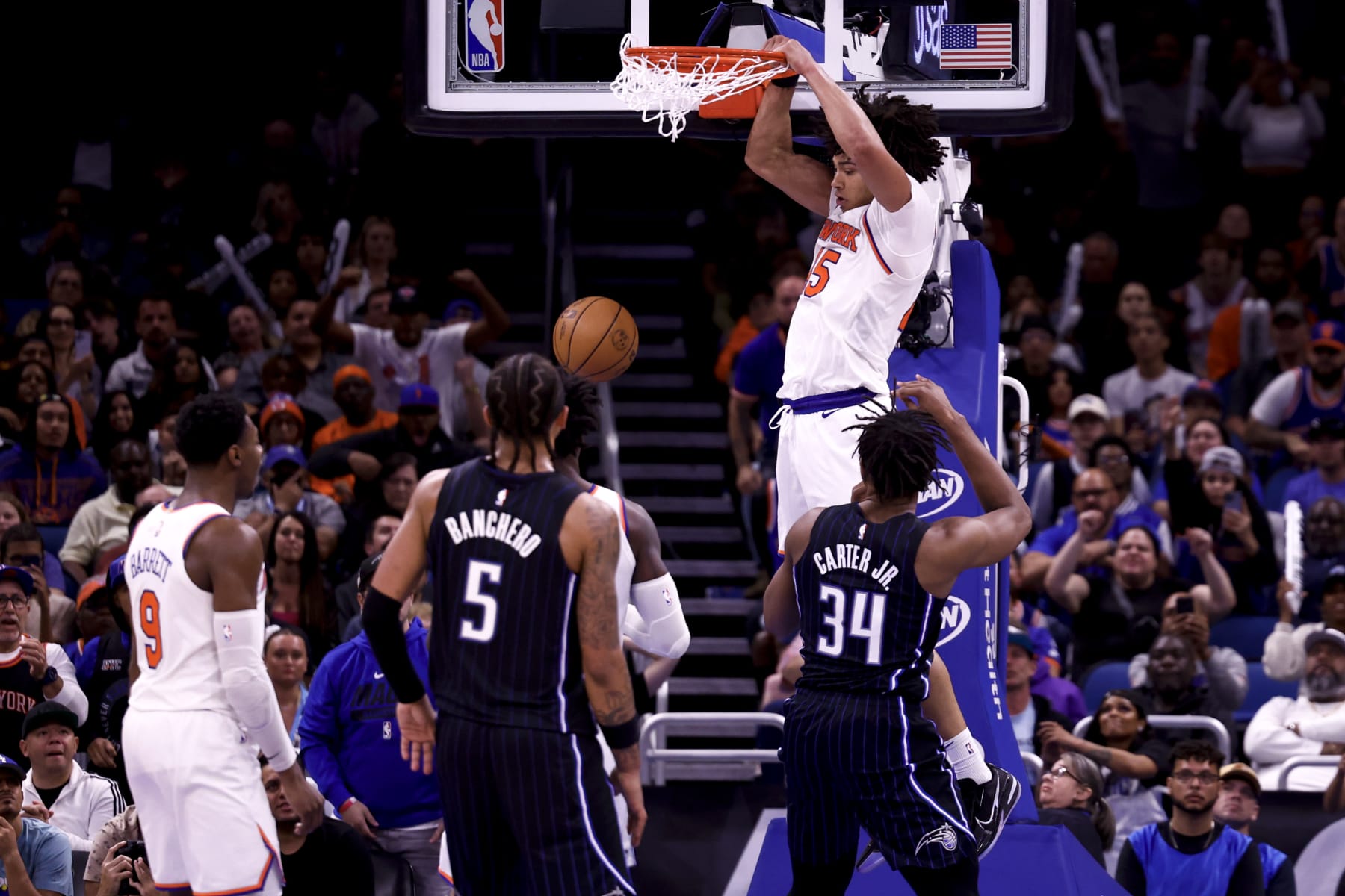 ORLANDO, FLORIDA - FEBRUARY 07: Jericho Sims #45 of the New York Knicks slamdunks the ball against the Orlando Magic during the fourth quarter at Amway Center on February 07, 2023 in Orlando, Florida. NOTE TO USER: User expressly acknowledges and agrees that, by downloading and or using this photograph, User is consenting to the terms and conditions of the Getty Images License Agreement. (Photo by Douglas P. DeFelice/Getty Images)