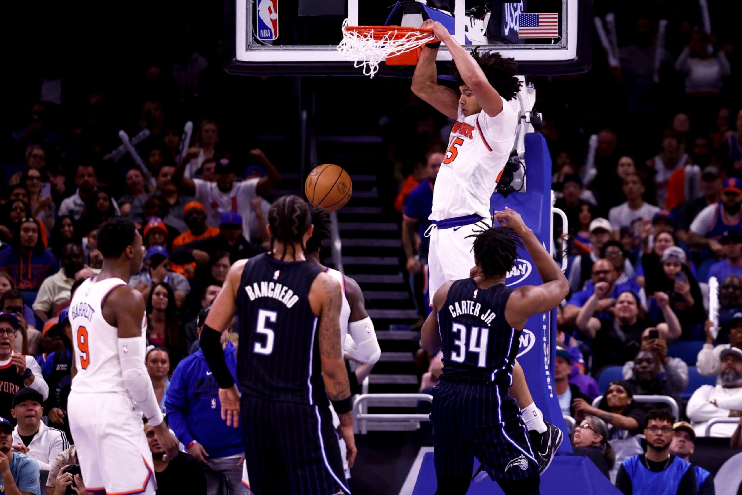 ORLANDO, FLORIDA - FEBRUARY 07: Jericho Sims #45 of the New York Knicks slamdunks the ball against the Orlando Magic during the fourth quarter at Amway Center on February 07, 2023 in Orlando, Florida. NOTE TO USER: User expressly acknowledges and agrees that, by downloading and or using this photograph, User is consenting to the terms and conditions of the Getty Images License Agreement. (Photo by Douglas P. DeFelice/Getty Images)