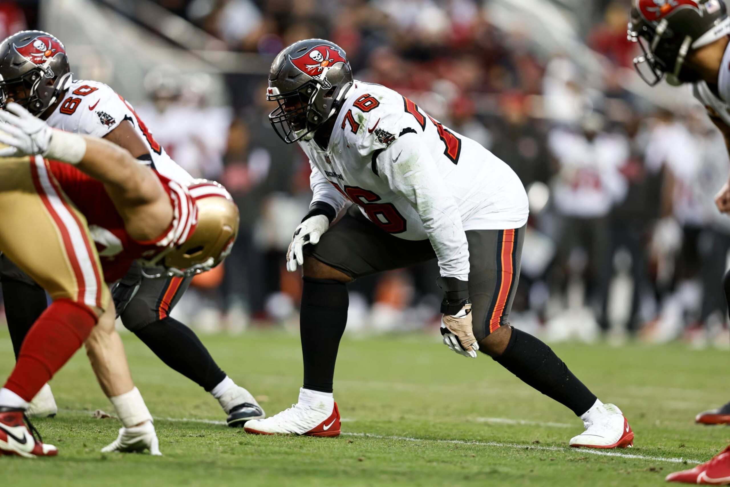 SANTA CLARA, CALIFORNIA - DECEMBER 11: Donovan Smith #76 of the Tampa Bay Buccaneers lines up during an NFL football game between the San Francisco 49ers and the Tampa Bay Buccaneers at Levi's Stadium on December 11, 2022 in Santa Clara, California. (Photo by Michael Owens/Getty Images) SANTA CLARA, CALIFORNIA - DECEMBER 11: Donovan Smith #76 of the Tampa Bay Buccaneers lines up during an NFL football game between the San Francisco 49ers and the Tampa Bay Buccaneers at Levi's Stadium on December 11, 2022 in Santa Clara, California. (Photo by Michael Owens/Getty Images)