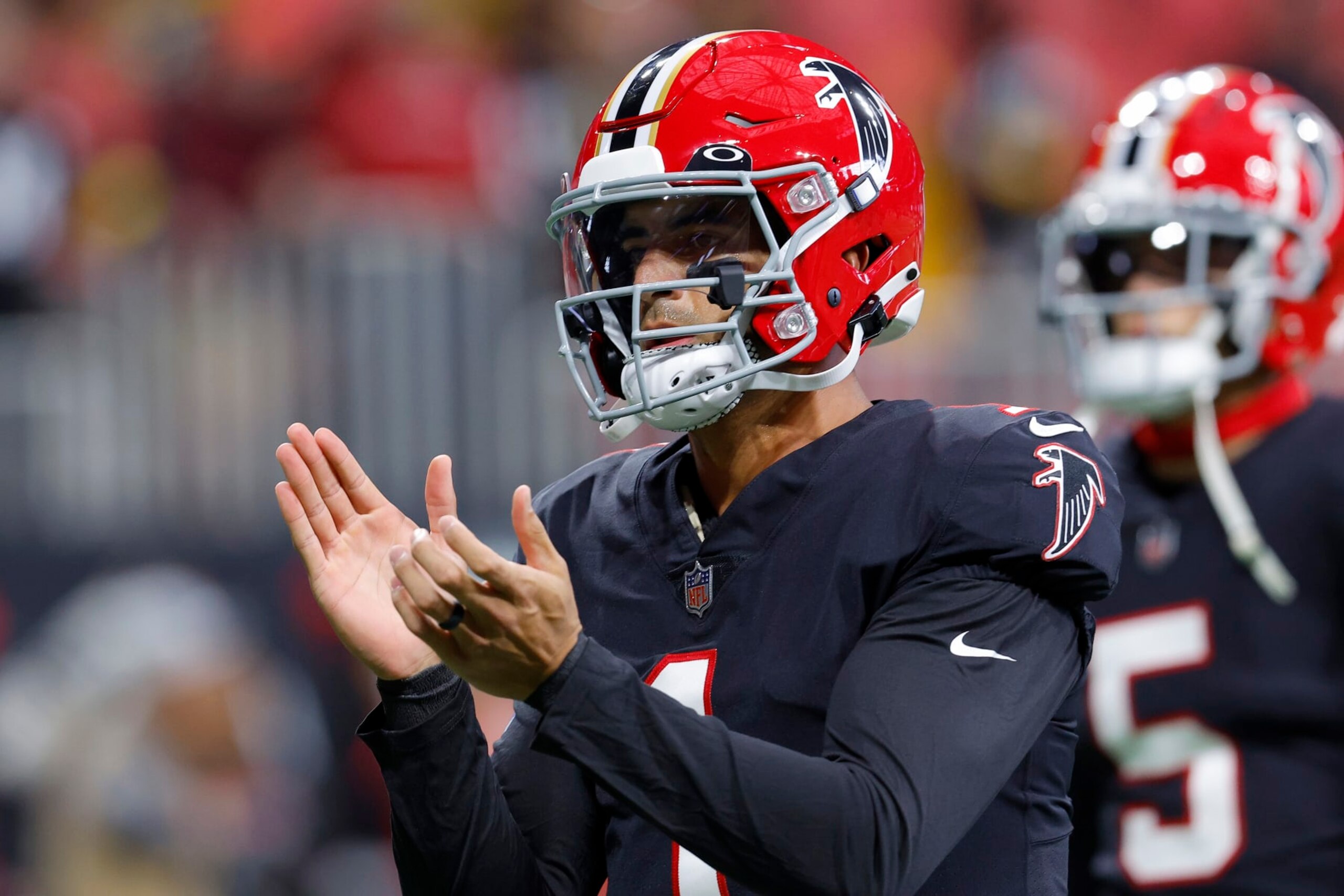 ATLANTA, GEORGIA - DECEMBER 04: Marcus Mariota #1 of the Atlanta Falcons looks on prior to a game against the Pittsburgh Steelers at Mercedes-Benz Stadium on December 04, 2022 in Atlanta, Georgia. (Photo by Todd Kirkland/Getty Images)