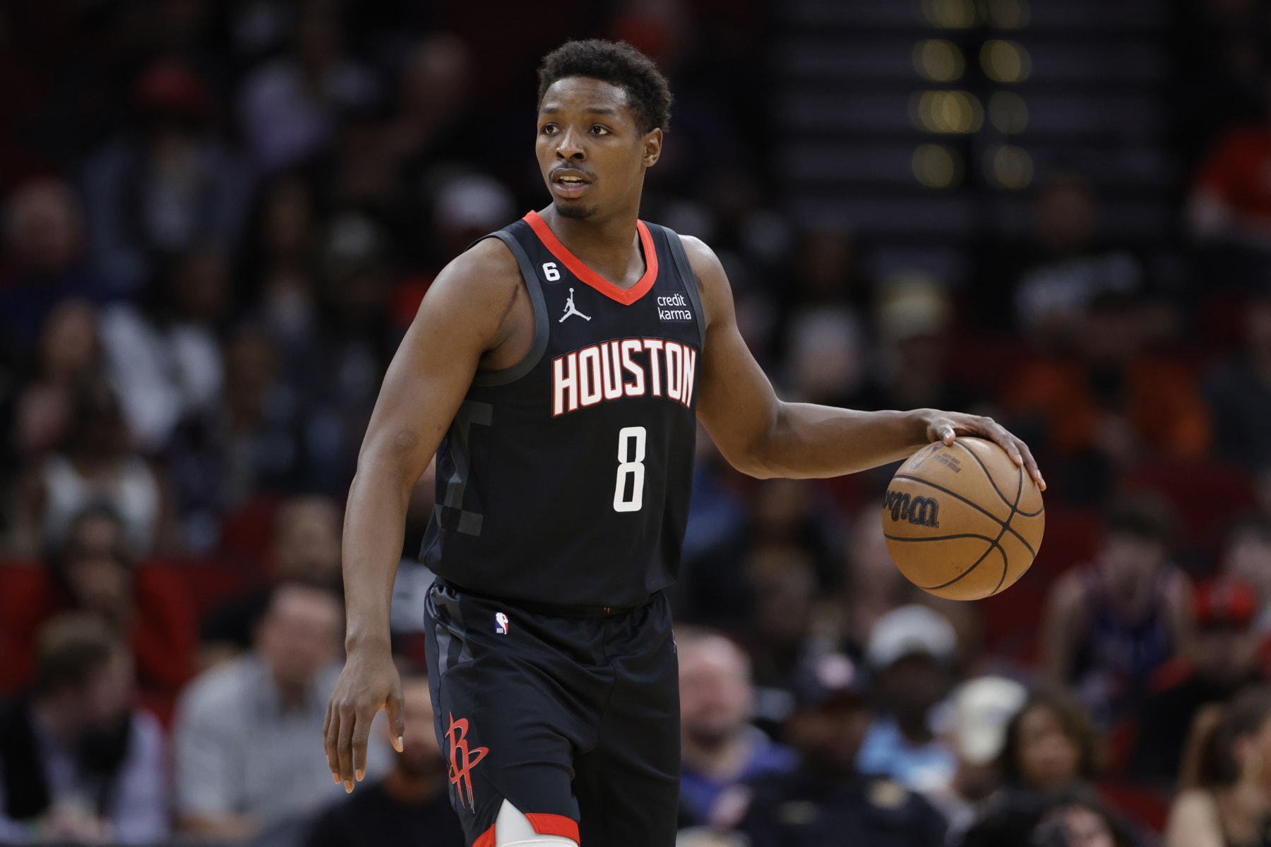 HOUSTON, TEXAS - FEBRUARY 06: Jae'Sean Tate #8 of the Houston Rockets controls the ball against the Sacramento Kings during the first half at Toyota Center on February 06, 2023 in Houston, Texas. NOTE TO USER: User expressly acknowledges and agrees that, by downloading and or using this photograph, User is consenting to the terms and conditions of the Getty Images License Agreement. (Photo by Carmen Mandato/Getty Images)