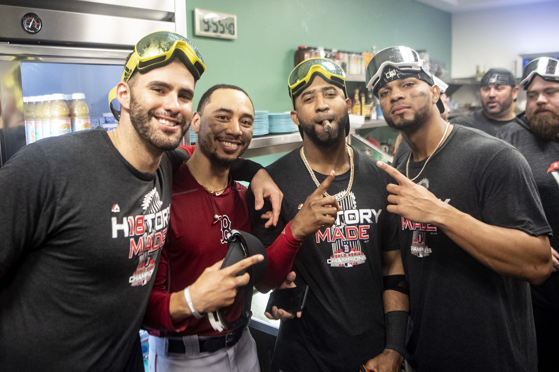 LOS ANGELES, CA - OCTOBER 28: J.D. Martinez #28, Mookie Betts #50, Eduardo Nunez #36, and Xander Bogaerts #2 of the Boston Red Sox celebrate in the clubhouse after winning the 2018 World Series in game five of the 2018 World Series against the Los Angeles Dodgers on October 28, 2018 at Dodger Stadium in Los Angeles, California. (Photo by Billie Weiss/Boston Red Sox/Getty Images)