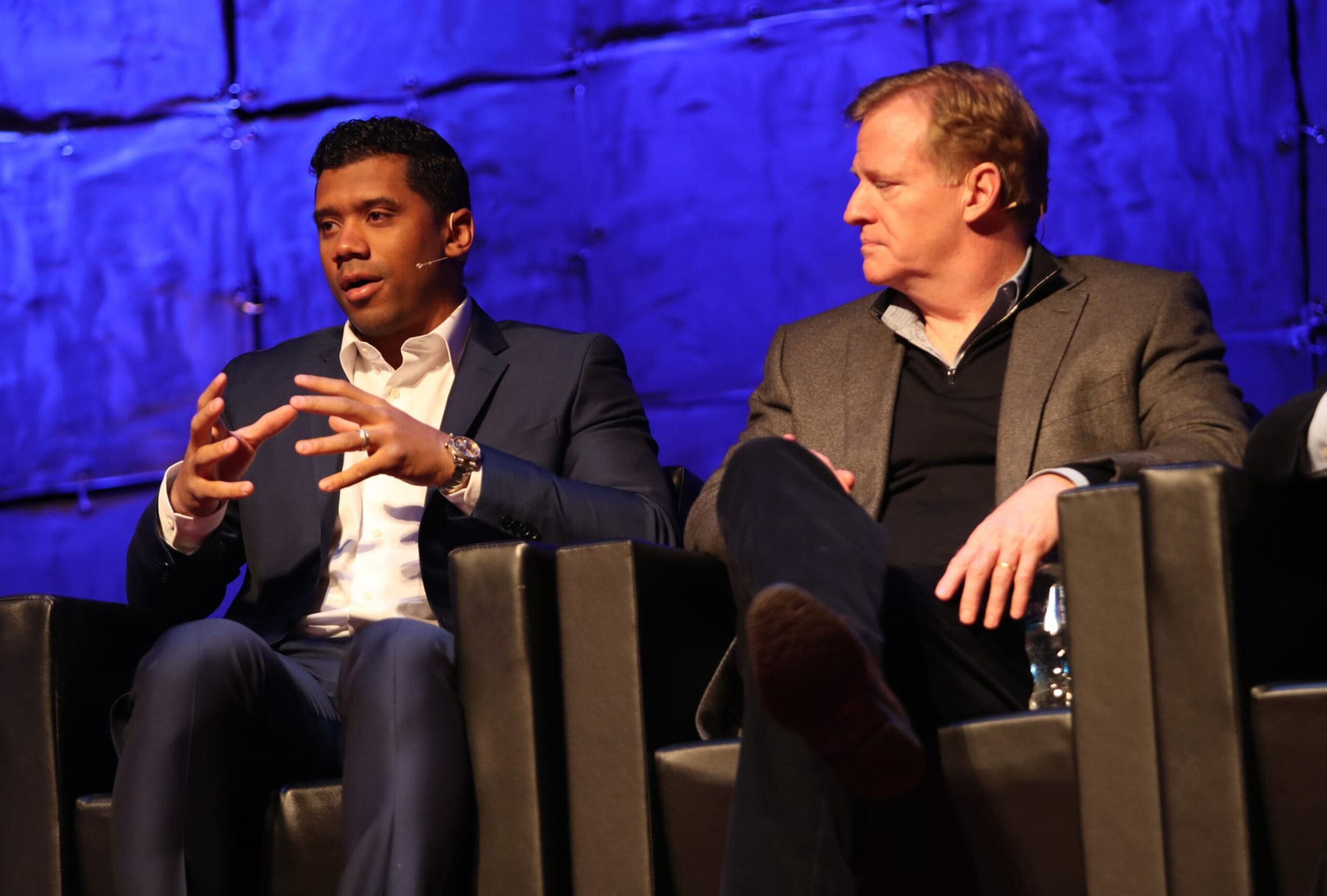 IMAGE DISTRIBUTED FOR NFL - Seattle Seahawks quarterback Russell Wilson, left, and NFL commissioner Roger Goodell participate in a panel discussion about the role of innovation in sports at the 1st and Future winner announcement event Saturday, Feb. 3, 2018 in Minneapolis. 1st and Future is the NFL's annual Super Bowl start-up competition designed to spur novel advancements in athlete safety and performance. (Jeff Lewis/AP Images for NFL)