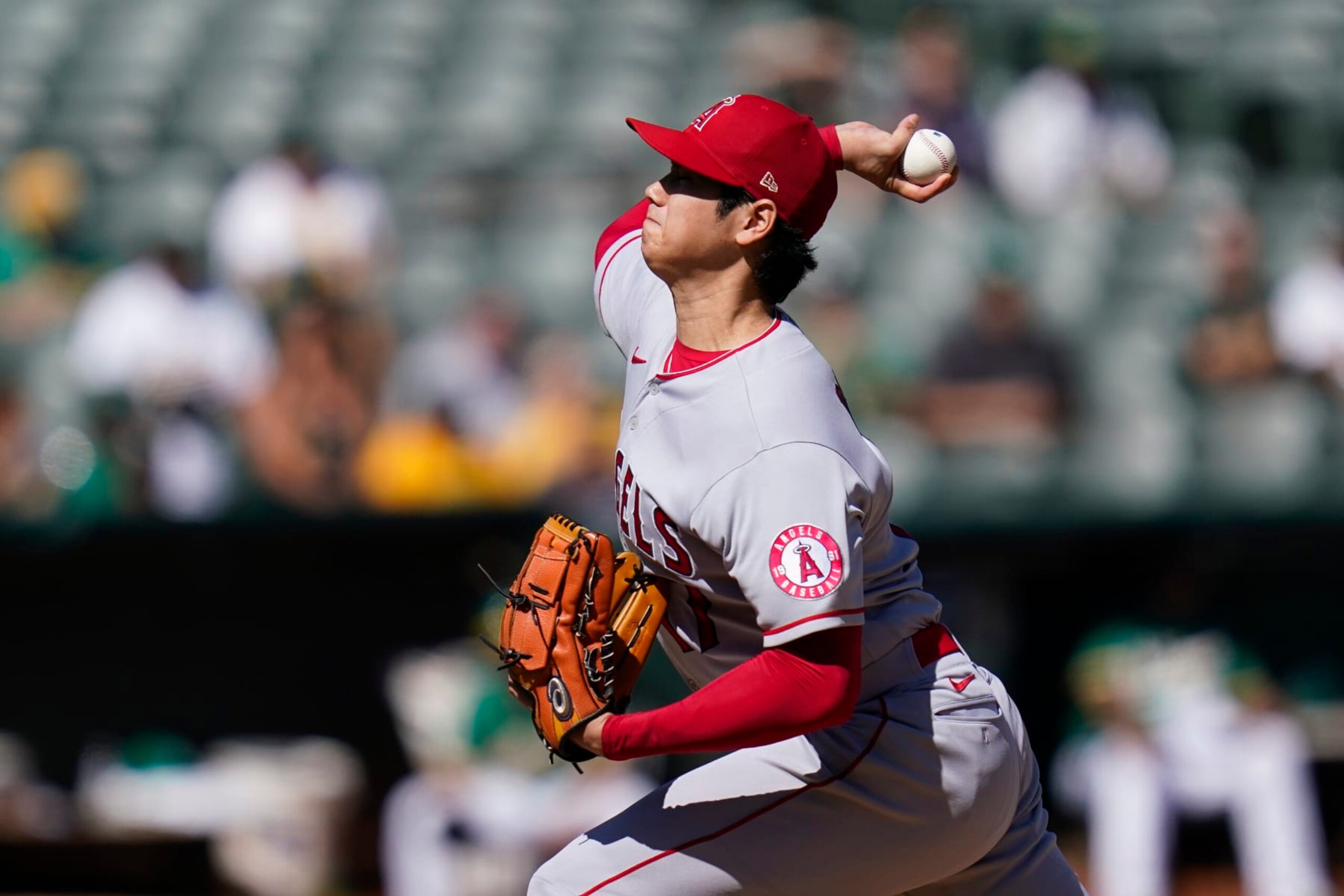 Los Angeles Angels' Shohei Ohtani pitches against the Oakland Athletics during the second inning of a baseball game in Oakland, Calif., Wednesday, Oct. 5, 2022. (AP Photo/Godofredo A. Vásquez)