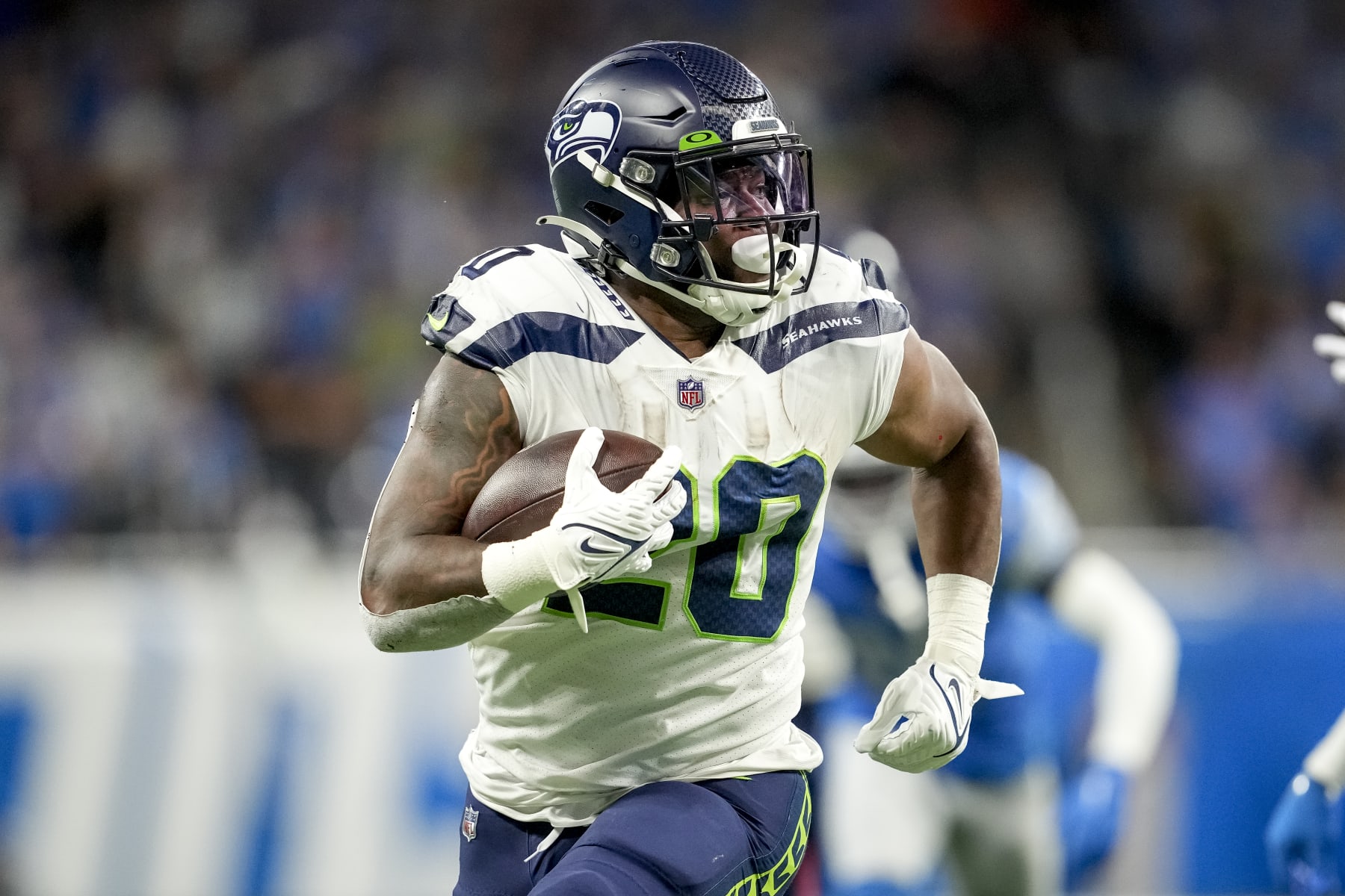 DETROIT, MICHIGAN - OCTOBER 02: Rashaad Penny #20 of the Seattle Seahawks runs the ball against the Detroit Lions at Ford Field on October 2, 2022 in Detroit, Michigan. (Photo by Nic Antaya/Getty Images)