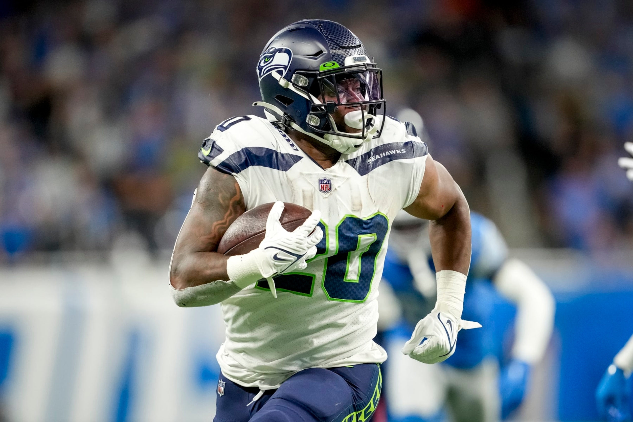 DETROIT, MICHIGAN - OCTOBER 02: Rashaad Penny #20 of the Seattle Seahawks runs the ball against the Detroit Lions at Ford Field on October 2, 2022 in Detroit, Michigan. (Photo by Nic Antaya/Getty Images) DETROIT, MICHIGAN - OCTOBER 02: Rashaad Penny #20 of the Seattle Seahawks runs the ball against the Detroit Lions at Ford Field on October 2, 2022 in Detroit, Michigan. (Photo by Nic Antaya/Getty Images)