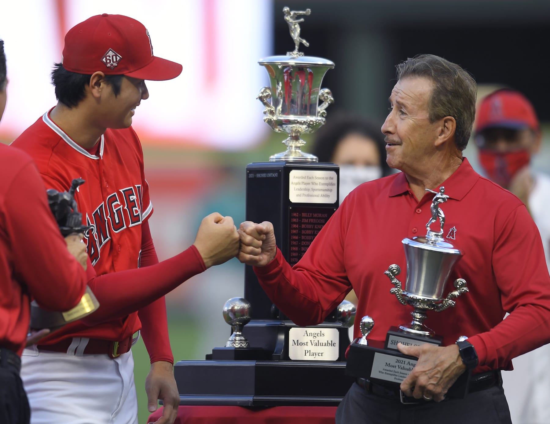 Shohei Ohtani and Angels owner Arte Moreno.