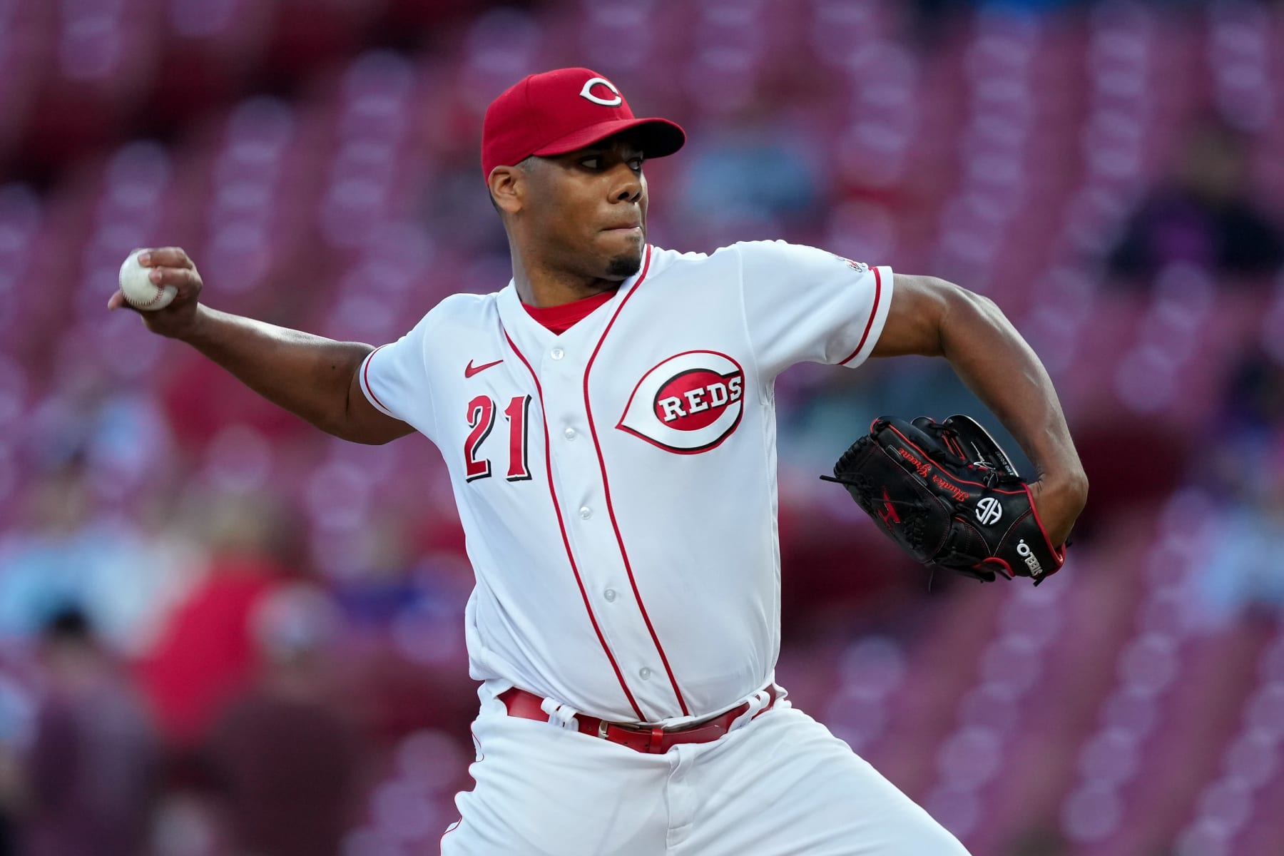 CINCINNATI, OHIO - OCTOBER 03: Hunter Greene #21 of the Cincinnati Reds pitches in the first inning against the Chicago Cubs at Great American Ball Park on October 03, 2022 in Cincinnati, Ohio. (Photo by Dylan Buell/Getty Images)