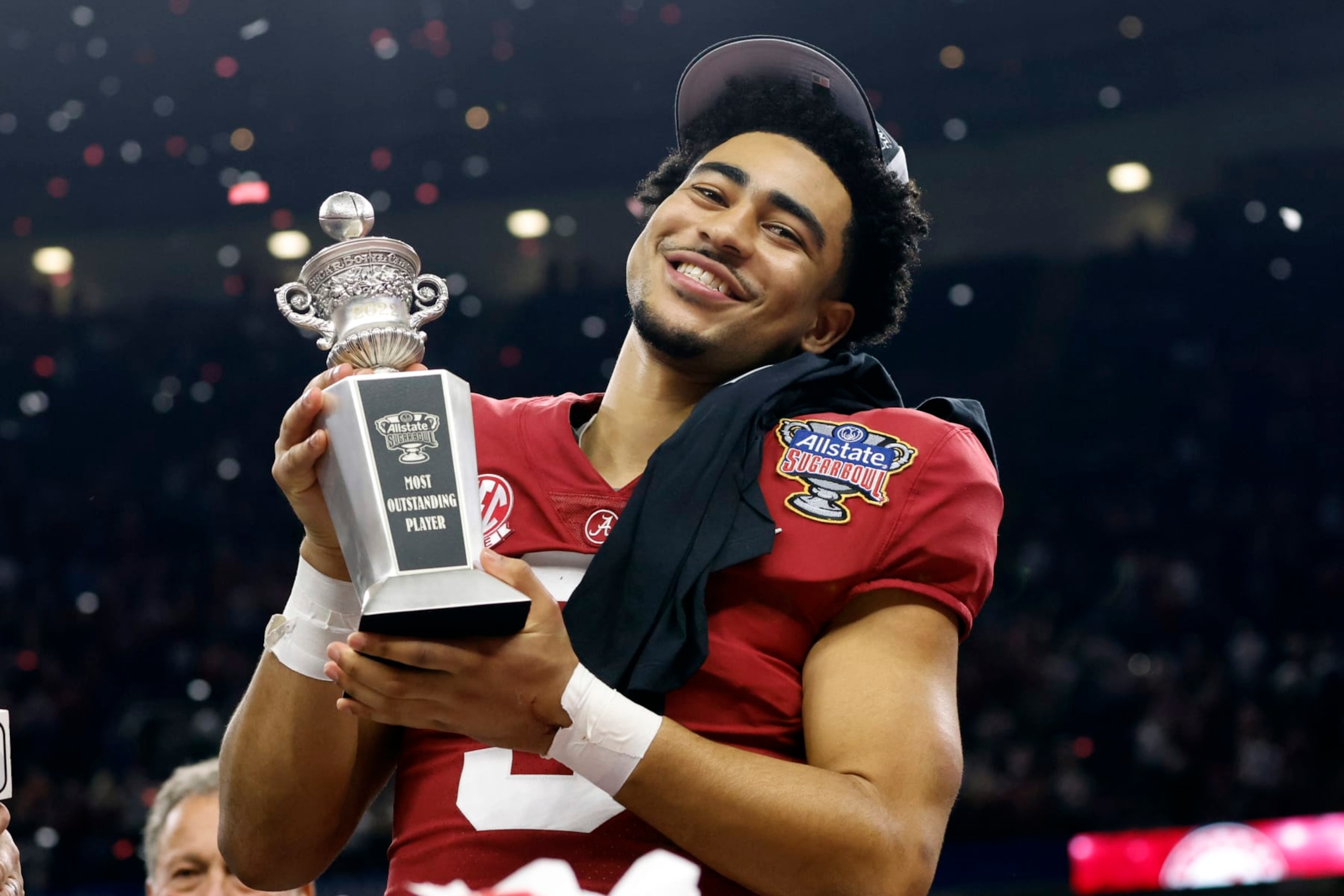 Alabama quarterback Bryce Young holds the Most Outstanding Player trophy as he celebrates after the Sugar Bowl NCAA college football game where Alabama defeated Kansas State 45-20, Saturday, Dec. 31, 2022, in New Orleans. (AP Photo/Butch Dill) Alabama quarterback Bryce Young holds the Most Outstanding Player trophy as he celebrates after the Sugar Bowl NCAA college football game where Alabama defeated Kansas State 45-20, Saturday, Dec. 31, 2022, in New Orleans. (AP Photo/Butch Dill)