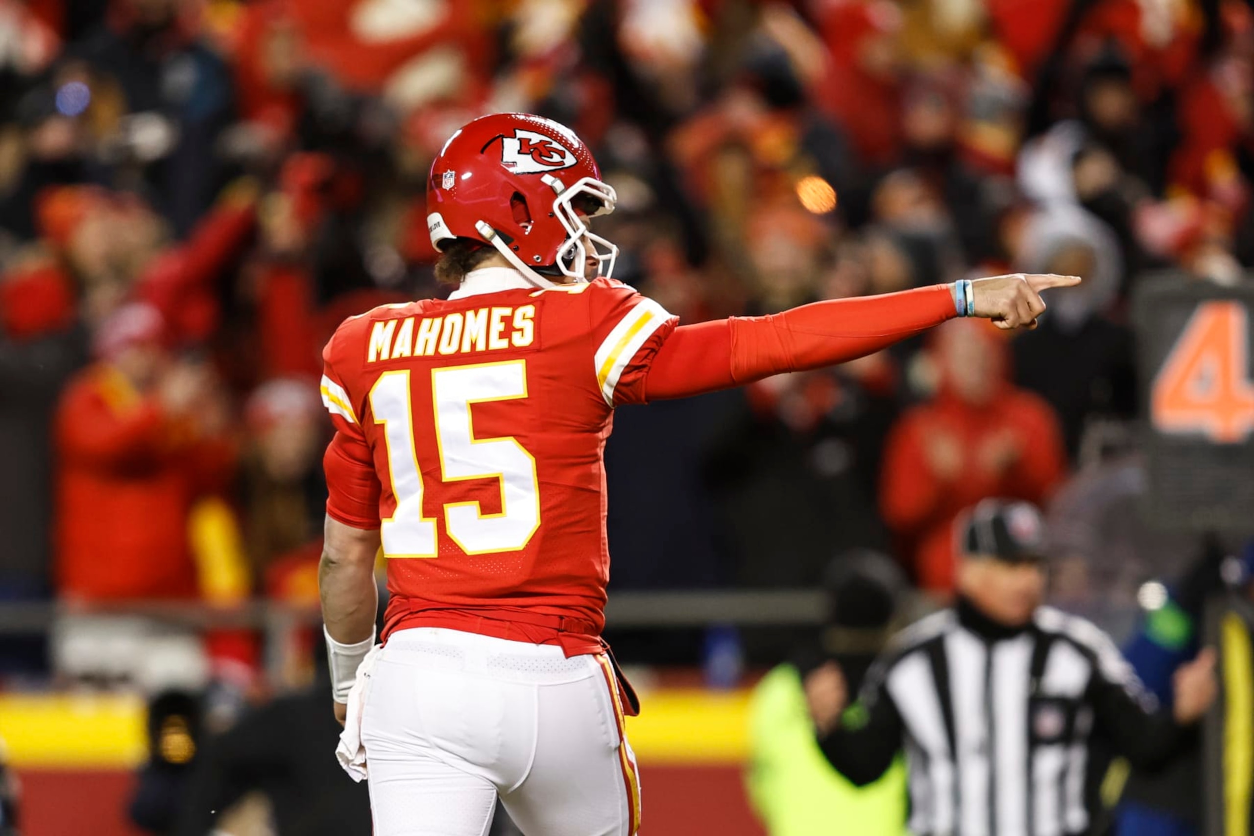 KANSAS CITY, MISSOURI - JANUARY 29: Patrick Mahomes #15 of the Kansas City Chiefs celebrates after passing for a touchdown during the AFC Championship NFL football game between the Kansas City Chiefs and the Cincinnati Bengals at GEHA Field at Arrowhead Stadium on January 29, 2023 in Kansas City, Missouri. (Photo by Michael Owens/Getty Images)