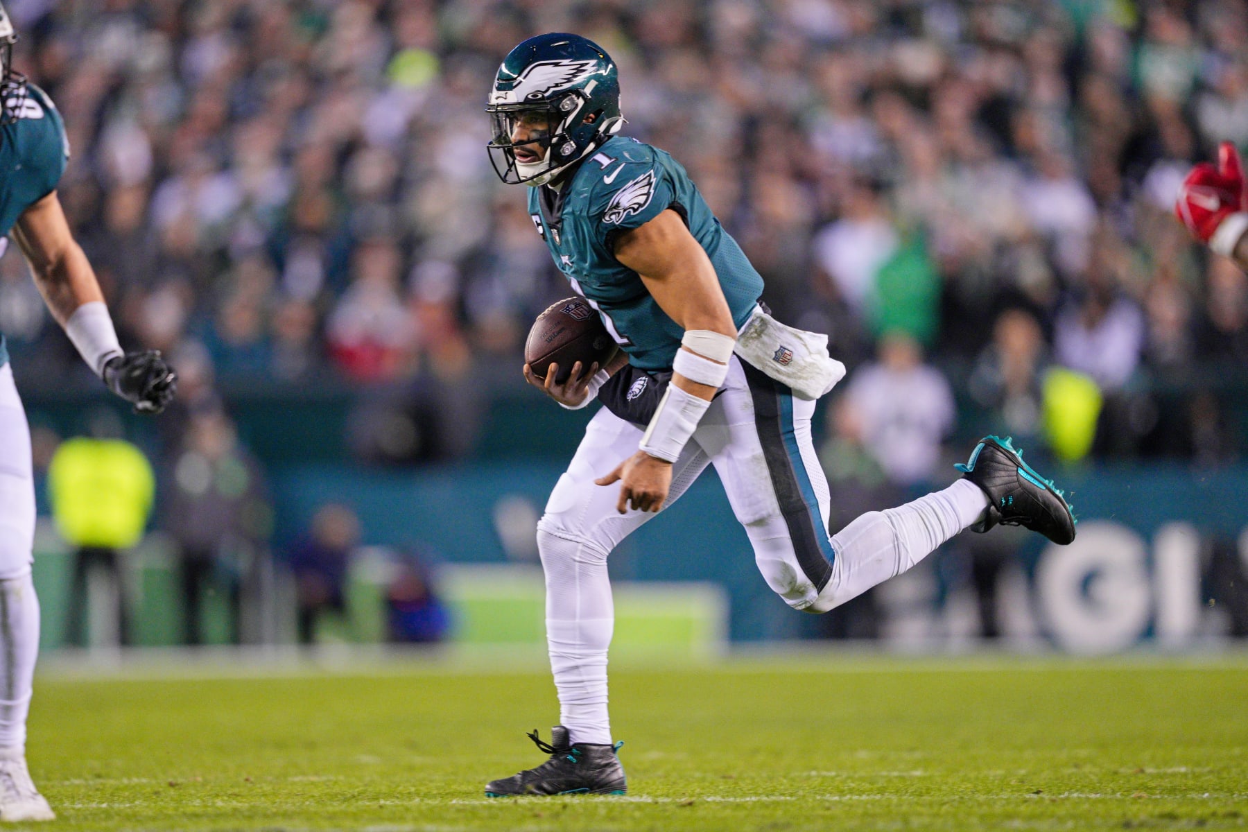 PHILADELPHIA, PA - JANUARY 29: Philadelphia Eagles quarterback Jalen Hurts (1) runs the ball during the Championship game between the San Fransisco 49ers and the Philadelphia Eagles on January 29, 2023. (Photo by Andy Lewis/Icon Sportswire via Getty Images)