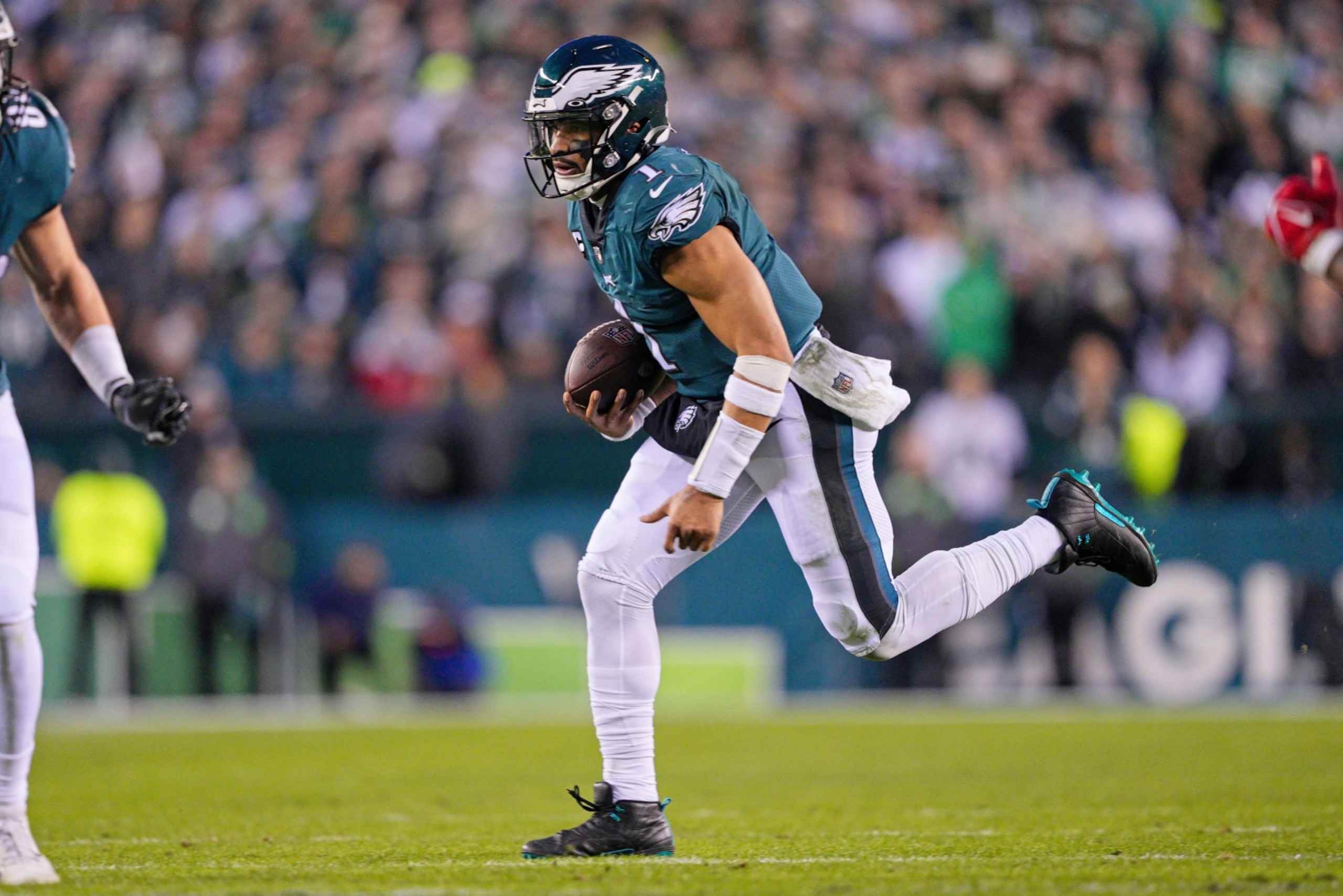 PHILADELPHIA, PA - JANUARY 29: Philadelphia Eagles quarterback Jalen Hurts (1) runs the ball during the Championship game between the San Fransisco 49ers and the Philadelphia Eagles on January 29, 2023. (Photo by Andy Lewis/Icon Sportswire via Getty Images)
