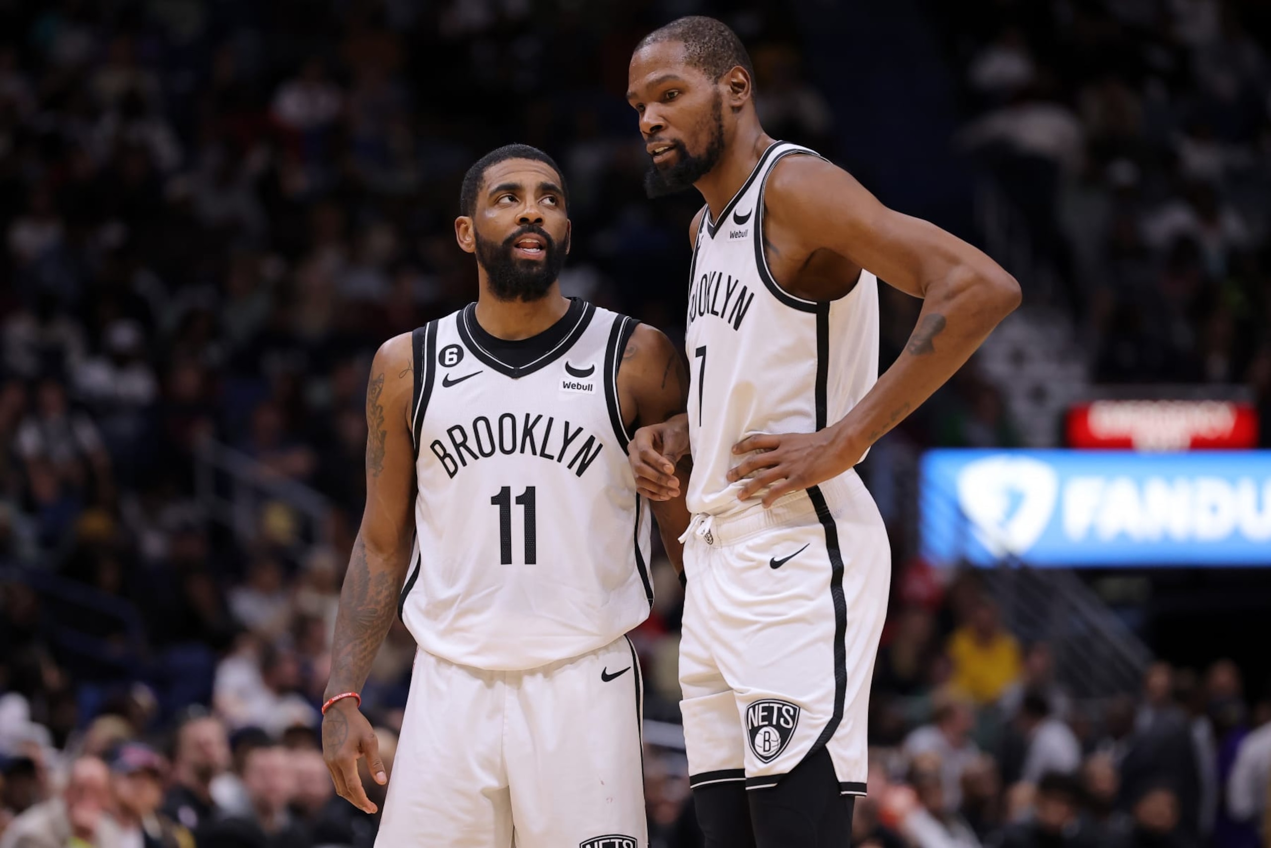 NEW ORLEANS, LOUISIANA - JANUARY 06: Kevin Durant #7 and Kyrie Irving #11 of the Brooklyn Nets react during a game against the New Orleans Pelicans at the Smoothie King Center on January 06, 2023 in New Orleans, Louisiana. NOTE TO USER: User expressly acknowledges and agrees that, by downloading and or using this Photograph, user is consenting to the terms and conditions of the Getty Images License Agreement. (Photo by Jonathan Bachman/Getty Images) NEW ORLEANS, LOUISIANA - JANUARY 06: Kevin Durant #7 and Kyrie Irving #11 of the Brooklyn Nets react during a game against the New Orleans Pelicans at the Smoothie King Center on January 06, 2023 in New Orleans, Louisiana. NOTE TO USER: User expressly acknowledges and agrees that, by downloading and or using this Photograph, user is consenting to the terms and conditions of the Getty Images License Agreement. (Photo by Jonathan Bachman/Getty Images)