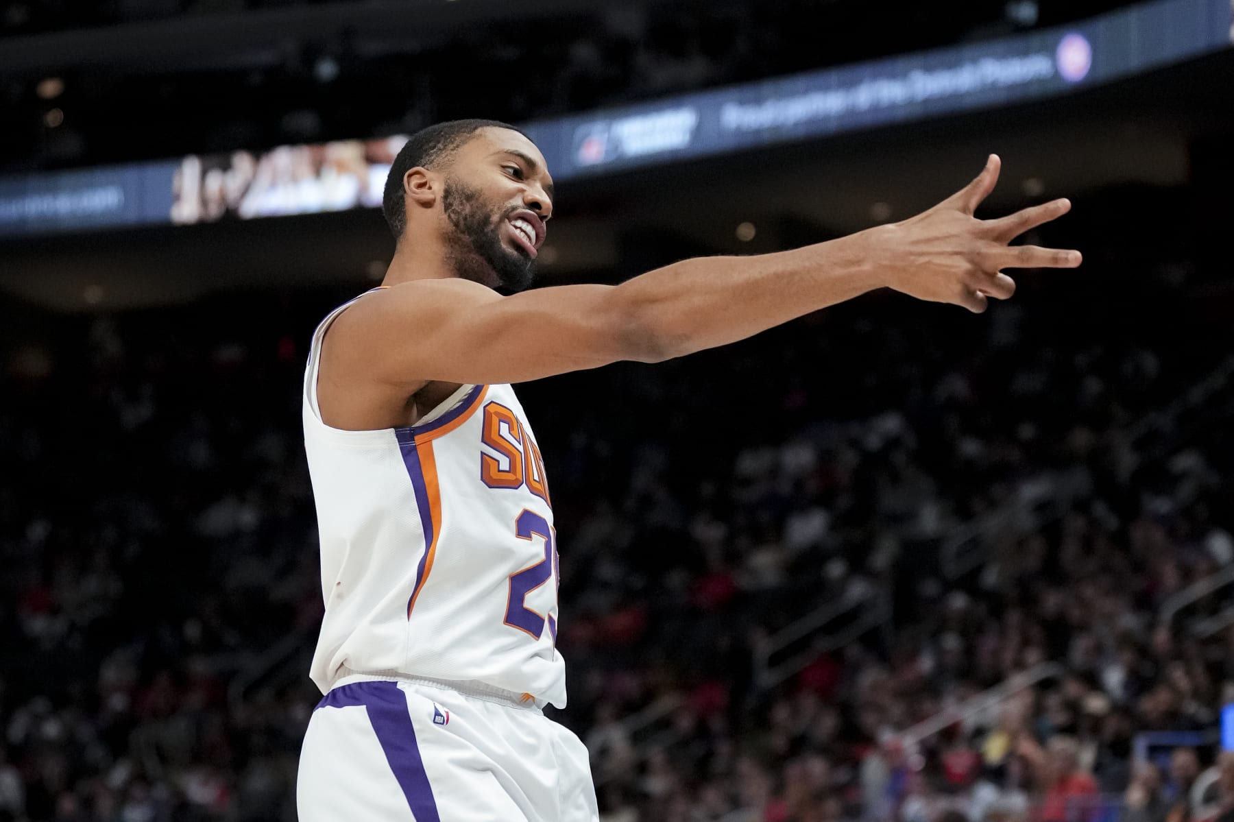 DETROIT, MICHIGAN - FEBRUARY 04: Mikal Bridges #25 of the Phoenix Suns reacts after making a 3-point basket against the Detroit Pistons during the fourth quarter at Little Caesars Arena on February 04, 2023 in Detroit, Michigan. NOTE TO USER: User expressly acknowledges and agrees that, by downloading and or using this photograph, User is consenting to the terms and conditions of the Getty Images License Agreement. (Photo by Nic Antaya/Getty Images)