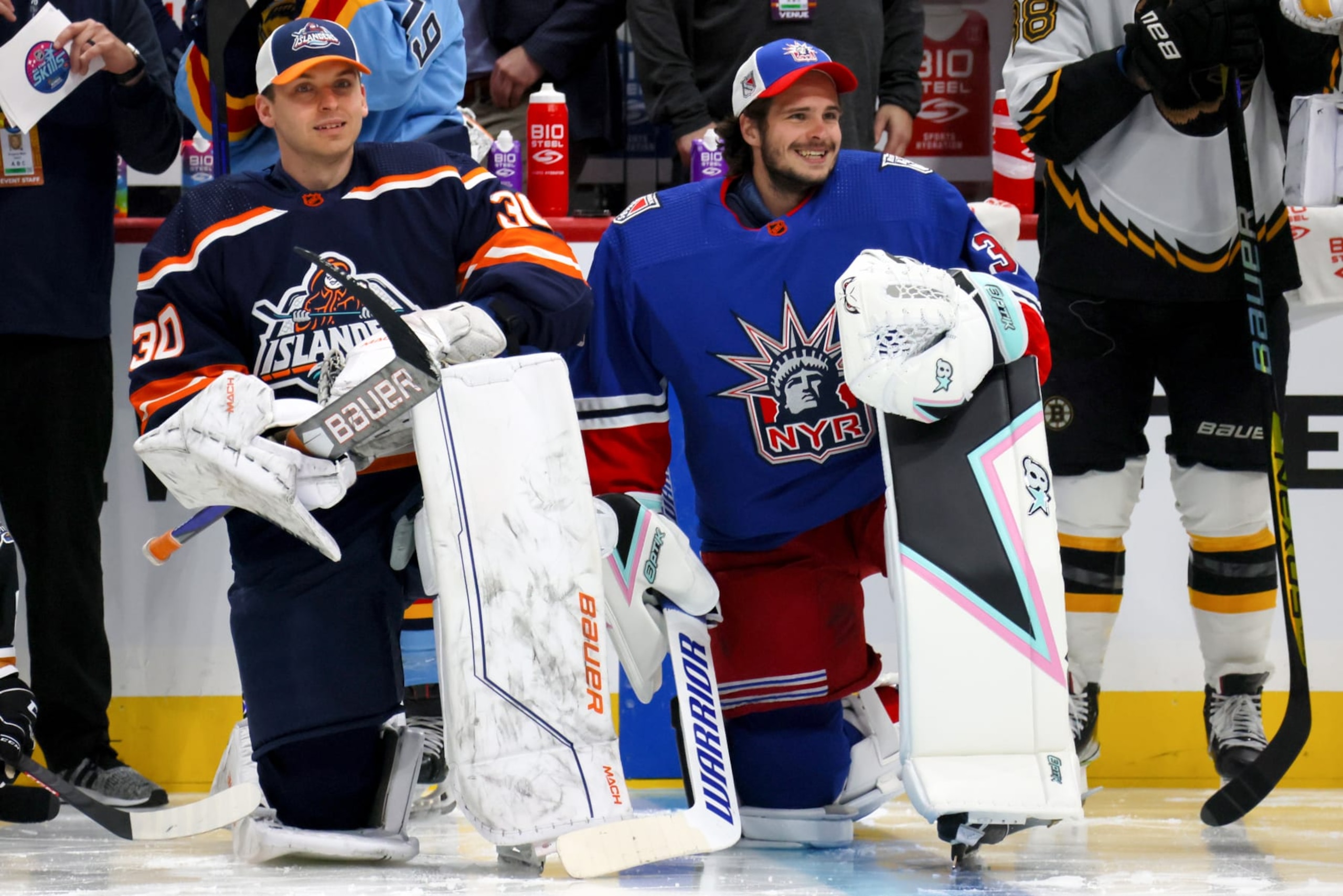 SUNRISE, FLORIDA - FEBRUARY 03: Ilya Sorokin #30 of the New York Islanders and Igor Shesterkin #31 of the New York Rangers kneel on the ice prior to the 2023 NHL All-Star Skills Competition at FLA Live Arena on February 03, 2023 in Sunrise, Florida. (Photo by Bruce Bennett/Getty Images)