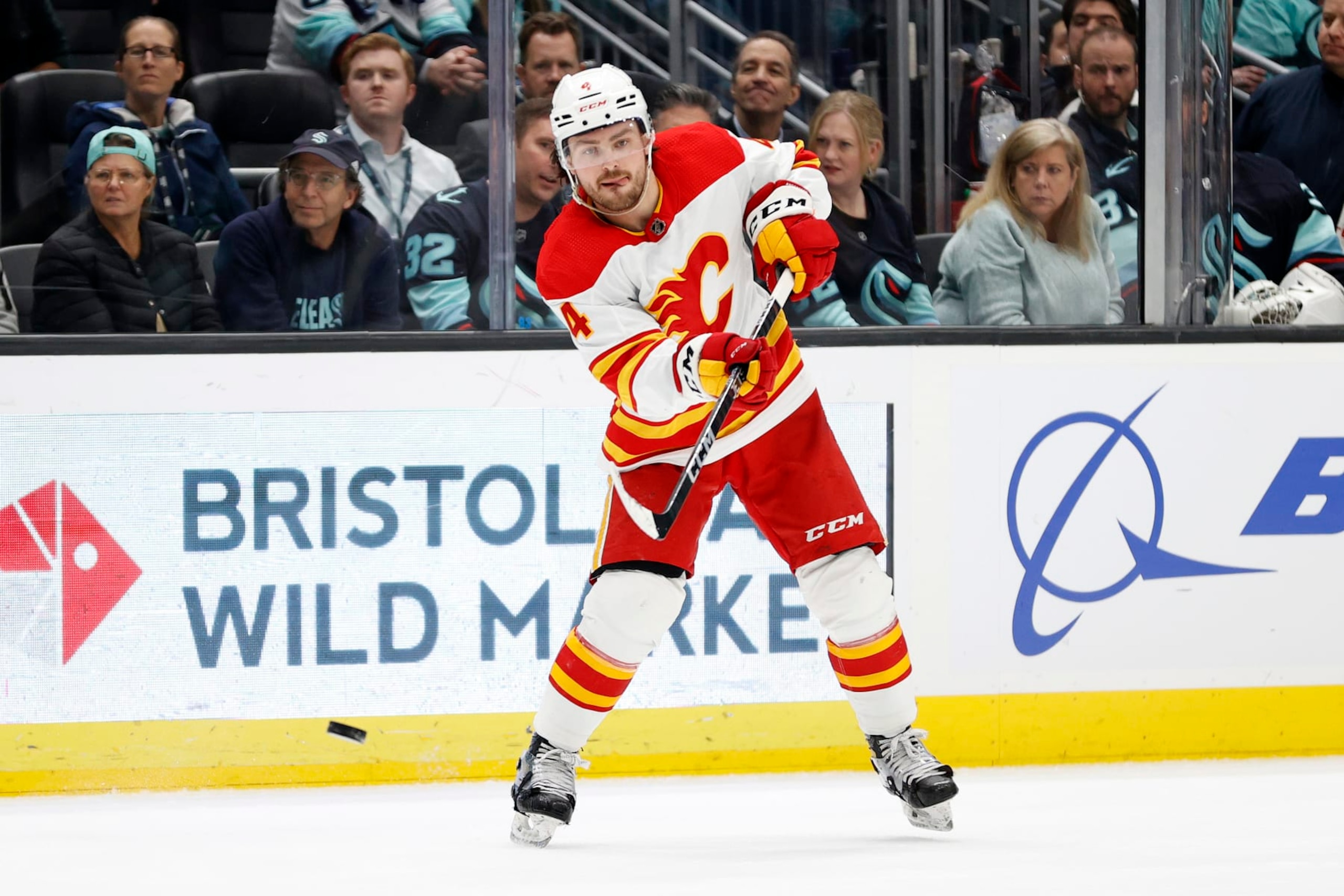 SEATTLE, WASHINGTON - JANUARY 27: Rasmus Andersson #4 of the Calgary Flames skates against the Seattle Kraken during the third period at Climate Pledge Arena on January 27, 2023 in Seattle, Washington. (Photo by Steph Chambers/Getty Images)