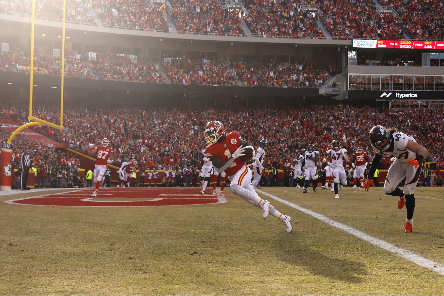 KANSAS CITY, MISSOURI - JANUARY 01: Jerick McKinnon #1 of the Kansas City Chiefs scores a touchdown during the fourth quarter in the game against the Denver Broncos at Arrowhead Stadium on January 01, 2023 in Kansas City, Missouri. (Photo by David Eulitt/Getty Images)