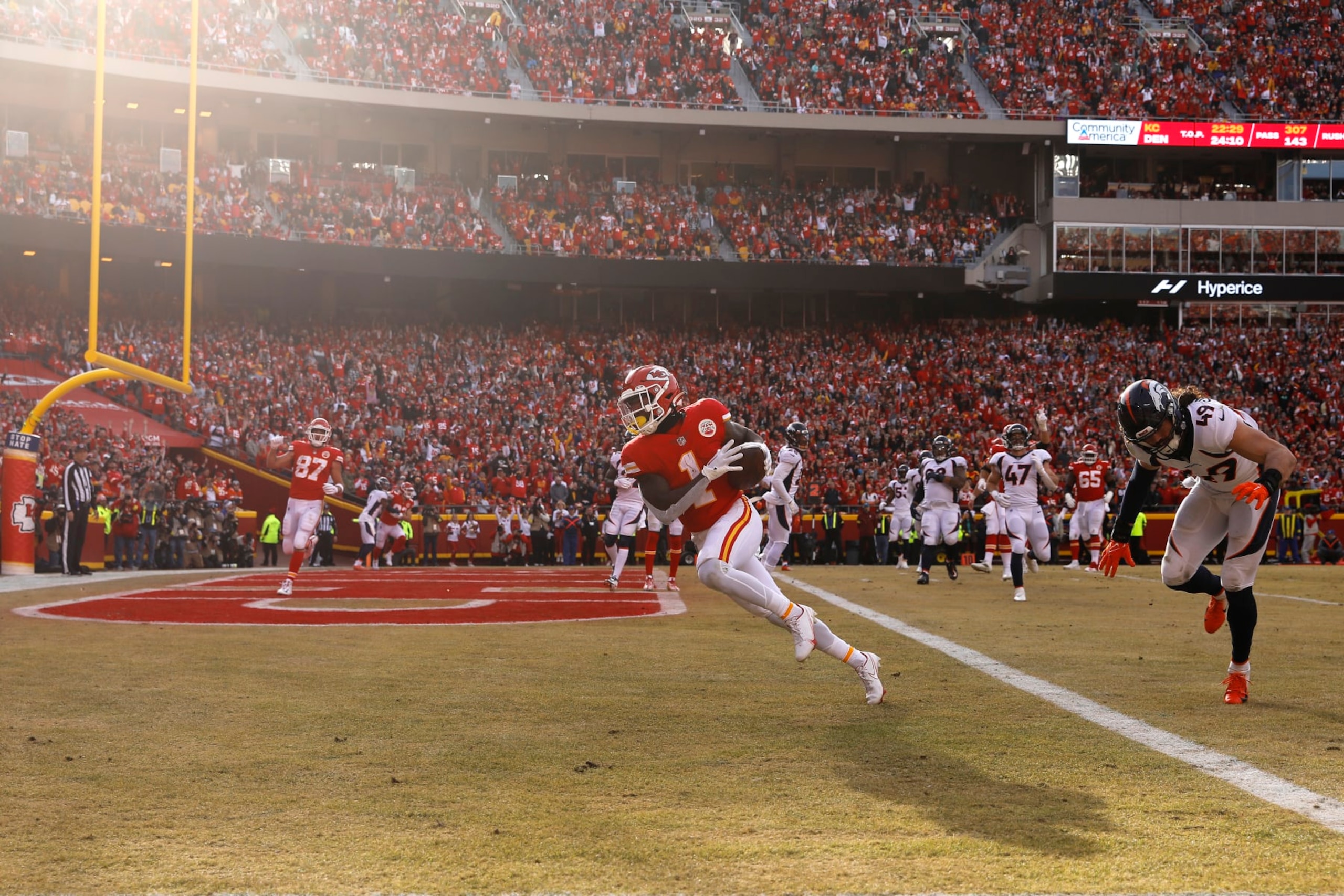 KANSAS CITY, MISSOURI - JANUARY 01: Jerick McKinnon #1 of the Kansas City Chiefs scores a touchdown during the fourth quarter in the game against the Denver Broncos at Arrowhead Stadium on January 01, 2023 in Kansas City, Missouri. (Photo by David Eulitt/Getty Images)