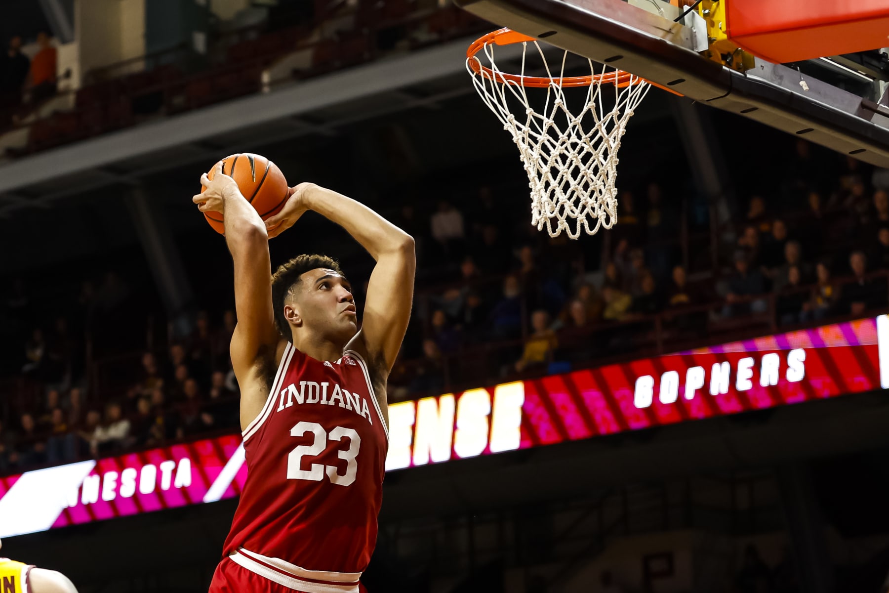 MINNEAPOLIS, MN - JANUARY 25: Trayce Jackson-Davis #23 of the Indiana Hoosiers dunks the ball against the Minnesota Golden Gophers in the second half of the game at Williams Arena on January 25, 2023 in Minneapolis, Minnesota. The Hoosiers defeated the Golden Gophers 61-57. (Photo by David Berding/Getty Images)