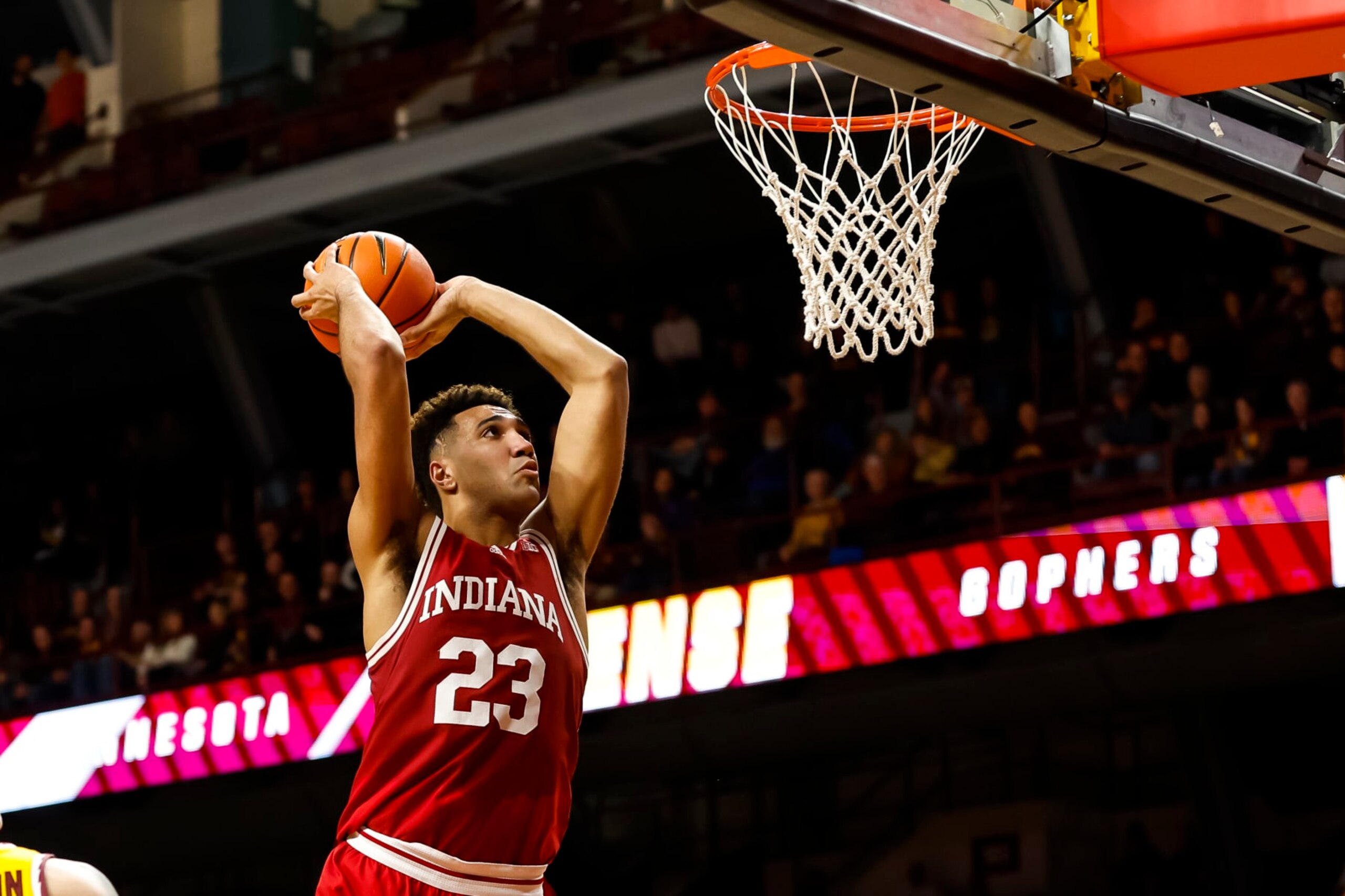 MINNEAPOLIS, MN - JANUARY 25: Trayce Jackson-Davis #23 of the Indiana Hoosiers dunks the ball against the Minnesota Golden Gophers in the second half of the game at Williams Arena on January 25, 2023 in Minneapolis, Minnesota. The Hoosiers defeated the Golden Gophers 61-57. (Photo by David Berding/Getty Images)