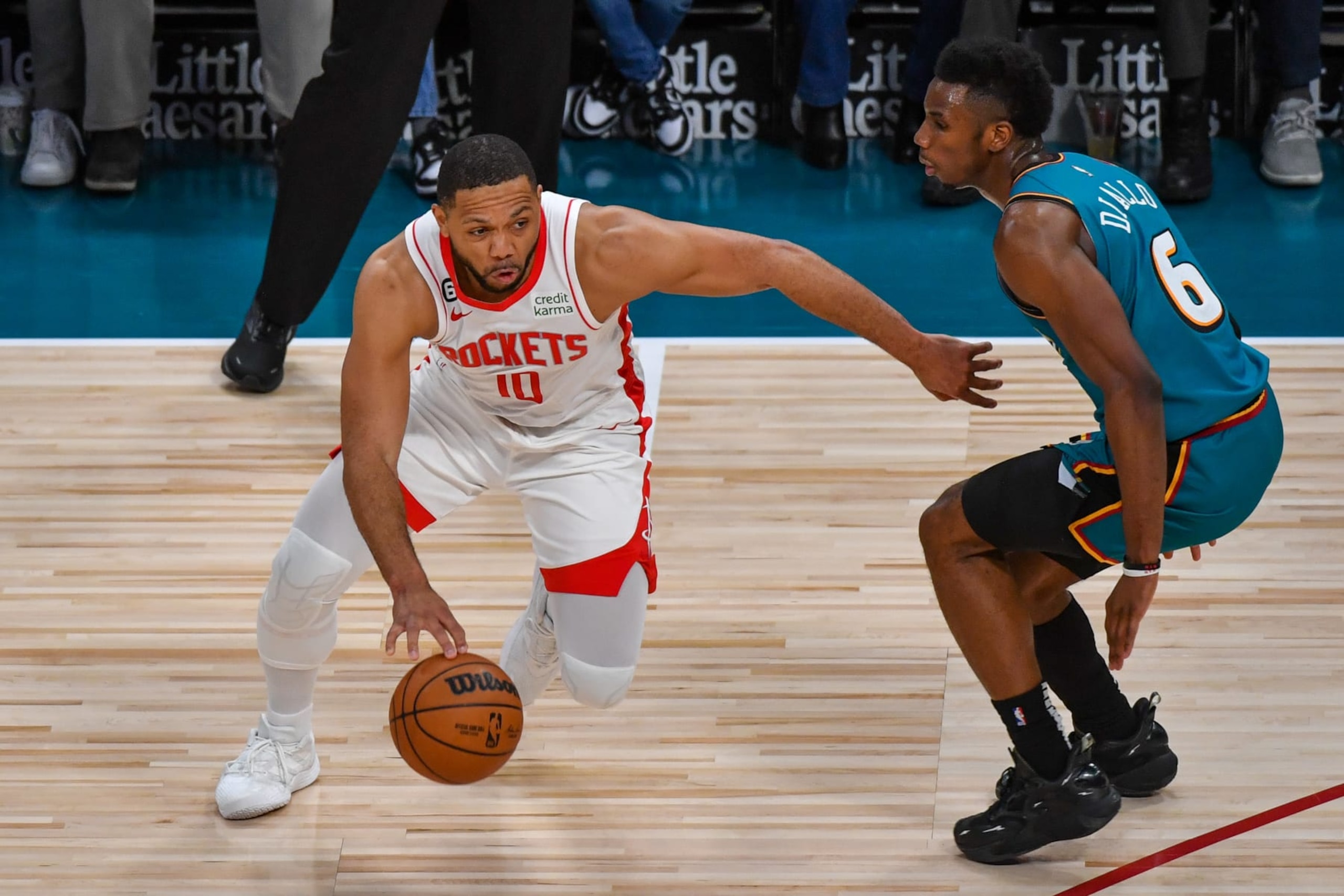 DETROIT, MICHIGAN - JANUARY 28: Eric Gordon #10 of the Houston Rockets looks to drive to the basket against Hamidou Diallo #6 of the Detroit Pistons during the second half of an NBA game at Little Caesars Arena on January 28, 2023 in Detroit, Michigan. The Houston Rockets won the game 117-114. NOTE TO USER: User expressly acknowledges and agrees that, by downloading and or using this photograph, User is consenting to the terms and conditions of the Getty Images License Agreement. (Photo by Aaron J. Thornton/Getty Images)