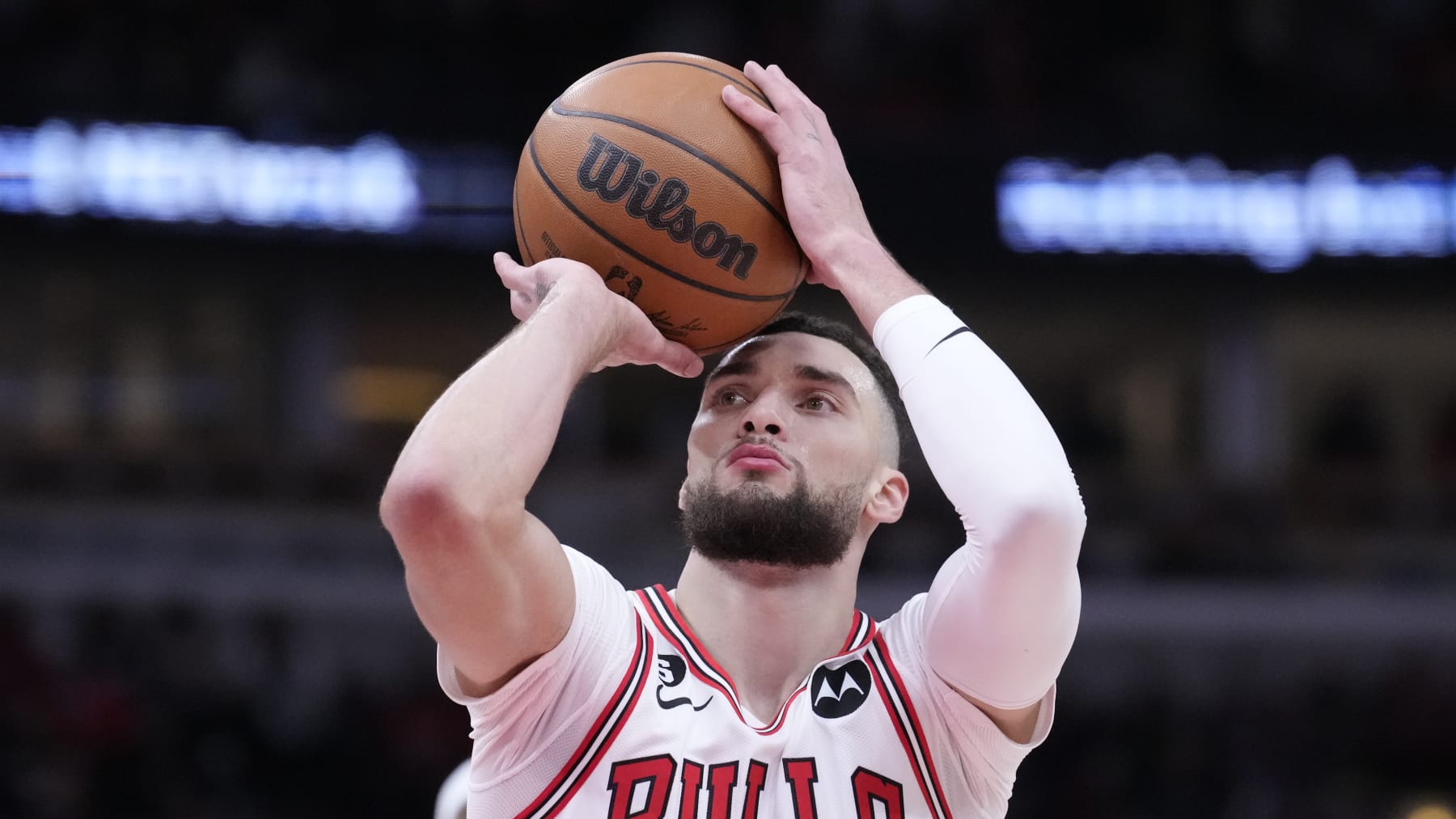 Chicago Bulls' Zach LaVine eyes a free throw during the first half of an NBA basketball game against the Chicago Bulls Thursday, Feb. 2, 2023, in Chicago. (AP Photo/Charles Rex Arbogast)