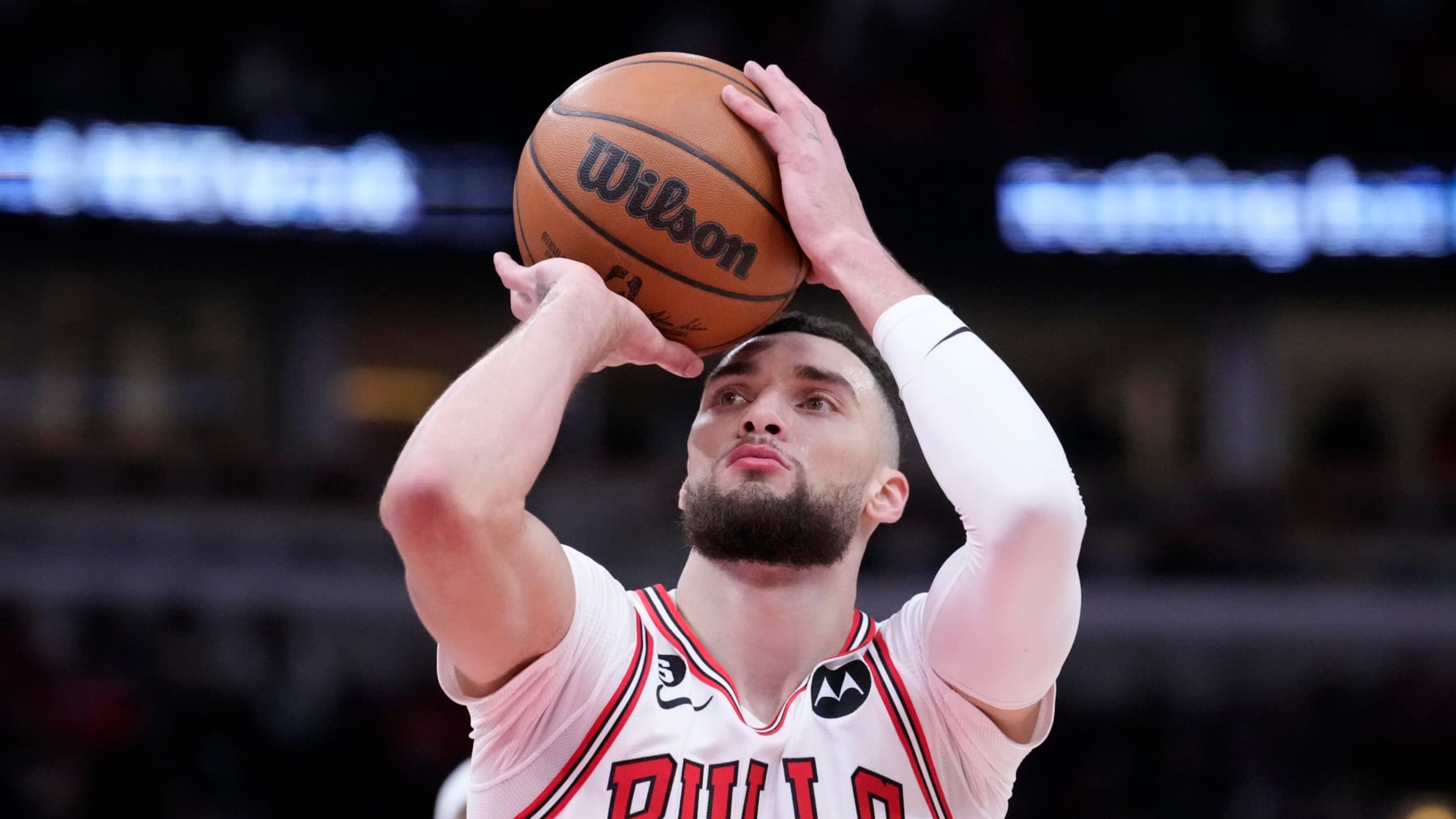 Chicago Bulls' Zach LaVine eyes a free throw during the first half of an NBA basketball game against the Chicago Bulls Thursday, Feb. 2, 2023, in Chicago. (AP Photo/Charles Rex Arbogast)