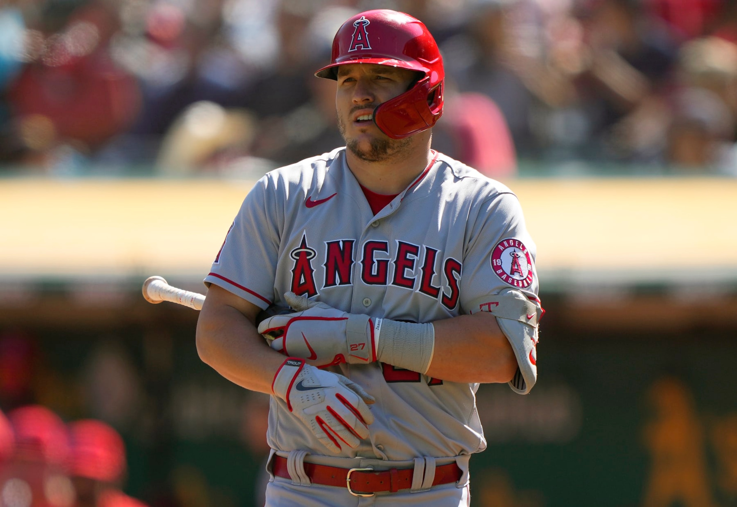 OAKLAND, CALIFORNIA - OCTOBER 05: Mike Trout #27 of the Los Angeles Angels looks on before stepping back into the batter box against the Oakland Athletics in the top of the first inn at RingCentral Coliseum on October 05, 2022 in Oakland, California. (Photo by Thearon W. Henderson/Getty Images)