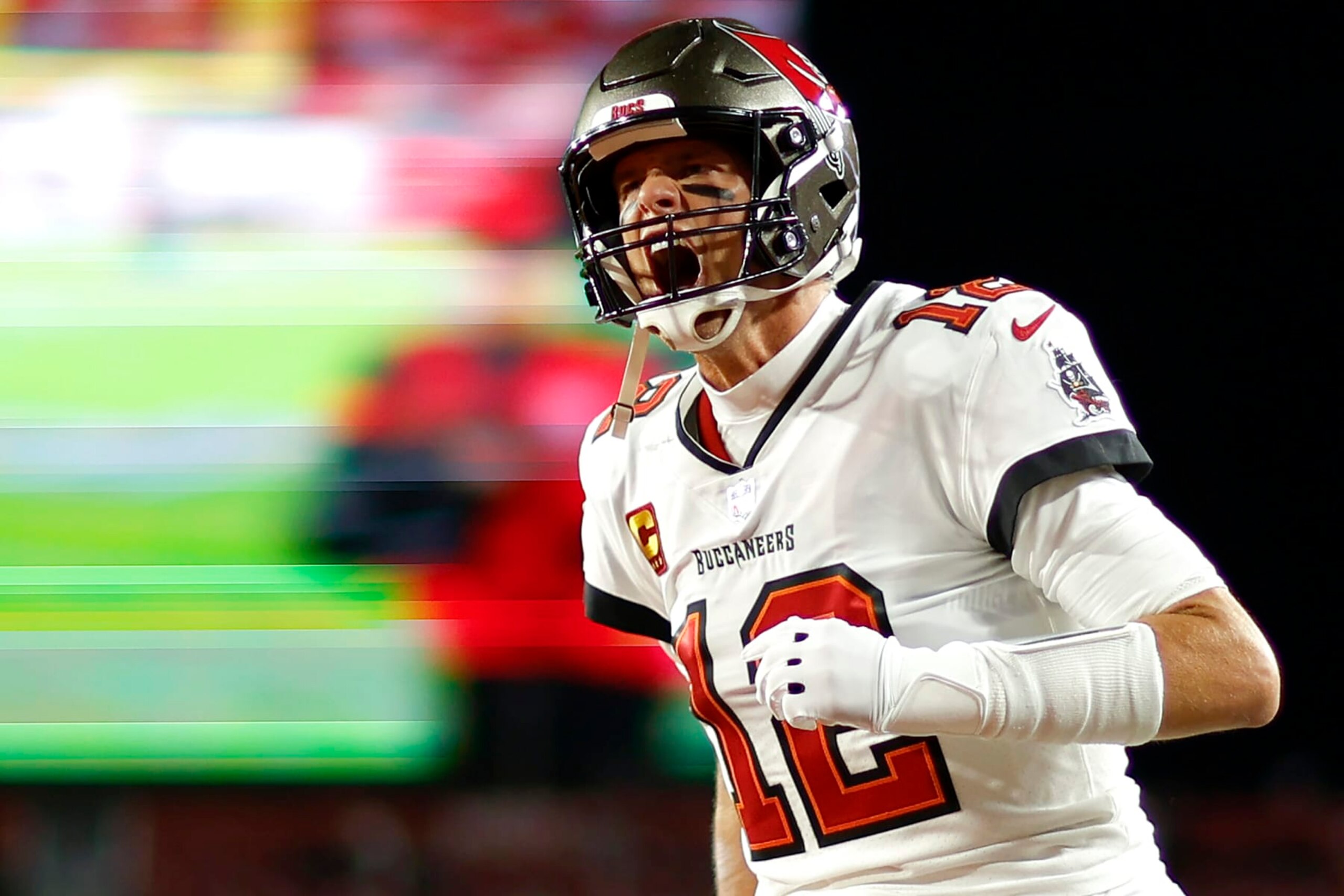 TAMPA, FLORIDA - JANUARY 16: Tom Brady #12 of the Tampa Bay Buccaneers yells as he runs on the field prior to the NFC Wild Card playoff game against the Dallas Cowboys at Raymond James Stadium on January 16, 2023 in Tampa, Florida. (Photo by Mike Ehrmann/Getty Images)