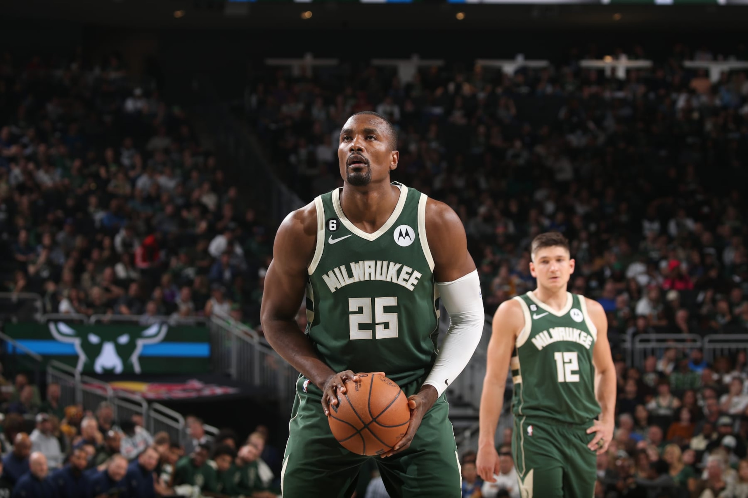 MILWAUKEE, WI - OCTOBER 22: Serge Ibaka #25 of the Milwaukee Bucks prepares to shoot a free throw during the game against the Houston Rockets on October 22, 2022 at the Fiserv Forum Center in Milwaukee, Wisconsin. NOTE TO USER: User expressly acknowledges and agrees that, by downloading and or using this Photograph, user is consenting to the terms and conditions of the Getty Images License Agreement. Mandatory Copyright Notice: Copyright 2022 NBAE (Photo by Gary Dineen/NBAE via Getty Images).