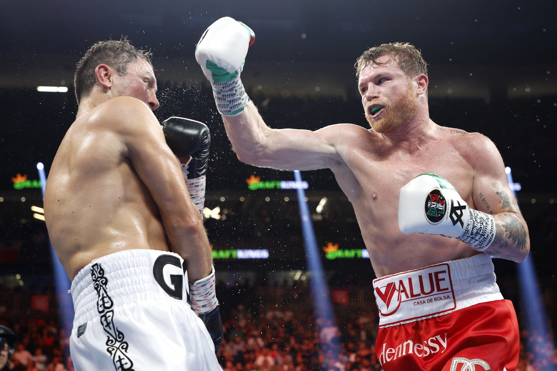 LAS VEGAS, NEVADA - SEPTEMBER 17: Canelo Alvarez (red trunks) and Gennadiy Golovkin (white trunks) exchange punches in the fight for the Super Middleweight Title at T-Mobile Arena on September 17, 2022 in Las Vegas, Nevada. (Photo by Sarah Stier/Getty Images)
