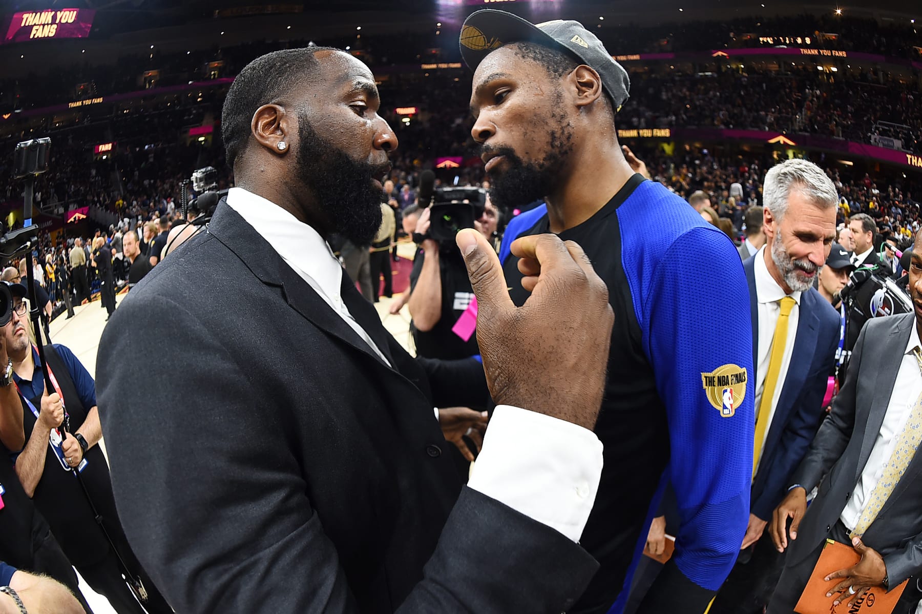 CLEVELAND, OH - JUNE 8: Kevin Durant #35 of the Golden State Warriors and Kendrick Perkins #21 of the Cleveland Cavaliers hug after Game Four of the 2018 NBA Finals on June 8, 2018 at Quicken Loans Arena in Cleveland, Ohio. NOTE TO USER: User expressly acknowledges and agrees that, by downloading and or using this Photograph, user is consenting to the terms and conditions of the Getty Images License Agreement. Mandatory Copyright Notice: Copyright 2018 NBAE (Photo by Andrew D. Bernstein/NBAE via Getty Images)
