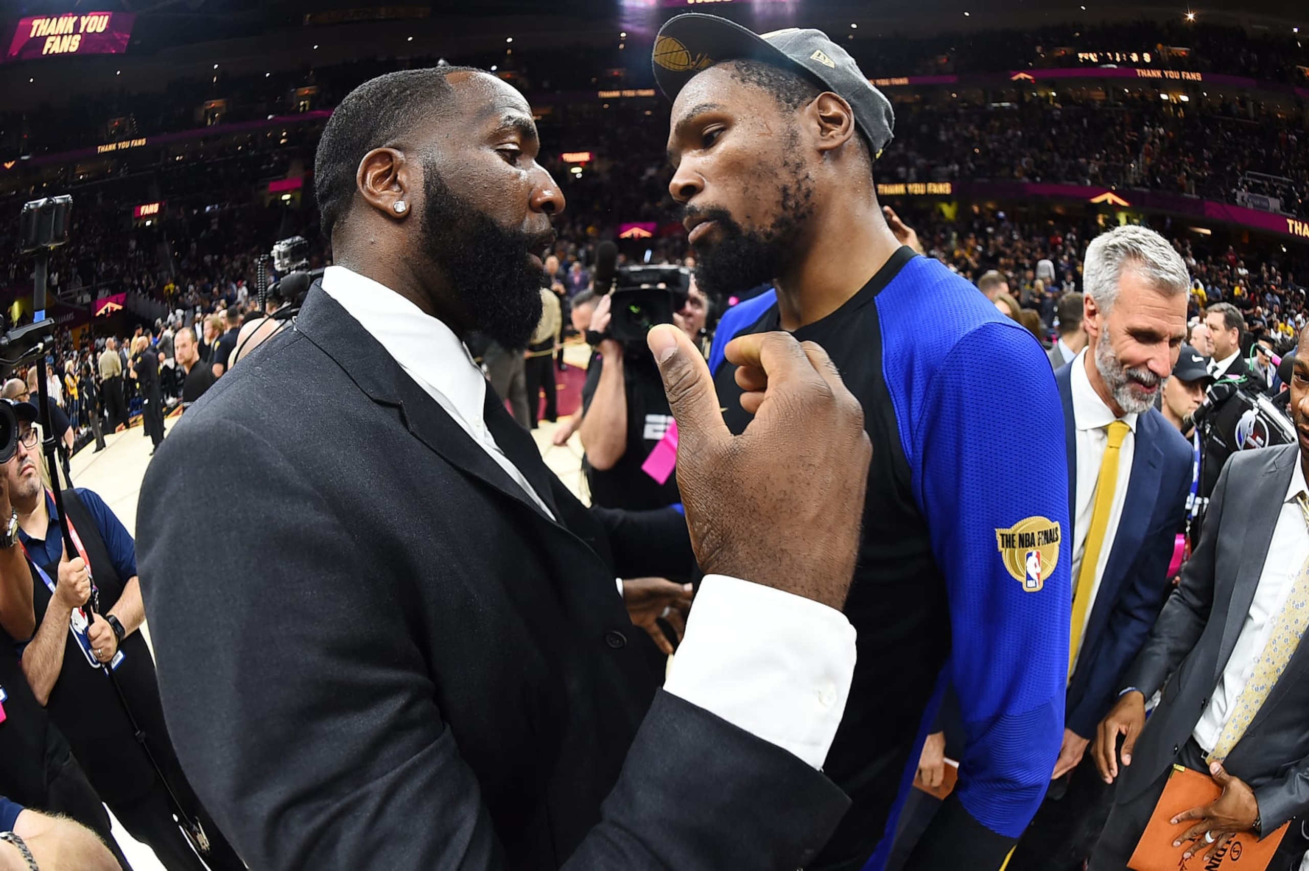 CLEVELAND, OH - JUNE 8: Kevin Durant #35 of the Golden State Warriors and Kendrick Perkins #21 of the Cleveland Cavaliers hug after Game Four of the 2018 NBA Finals on June 8, 2018 at Quicken Loans Arena in Cleveland, Ohio. NOTE TO USER: User expressly acknowledges and agrees that, by downloading and or using this Photograph, user is consenting to the terms and conditions of the Getty Images License Agreement. Mandatory Copyright Notice: Copyright 2018 NBAE (Photo by Andrew D. Bernstein/NBAE via Getty Images) CLEVELAND, OH - JUNE 8: Kevin Durant #35 of the Golden State Warriors and Kendrick Perkins #21 of the Cleveland Cavaliers hug after Game Four of the 2018 NBA Finals on June 8, 2018 at Quicken Loans Arena in Cleveland, Ohio. NOTE TO USER: User expressly acknowledges and agrees that, by downloading and or using this Photograph, user is consenting to the terms and conditions of the Getty Images License Agreement. Mandatory Copyright Notice: Copyright 2018 NBAE (Photo by Andrew D. Bernstein/NBAE via Getty Images)