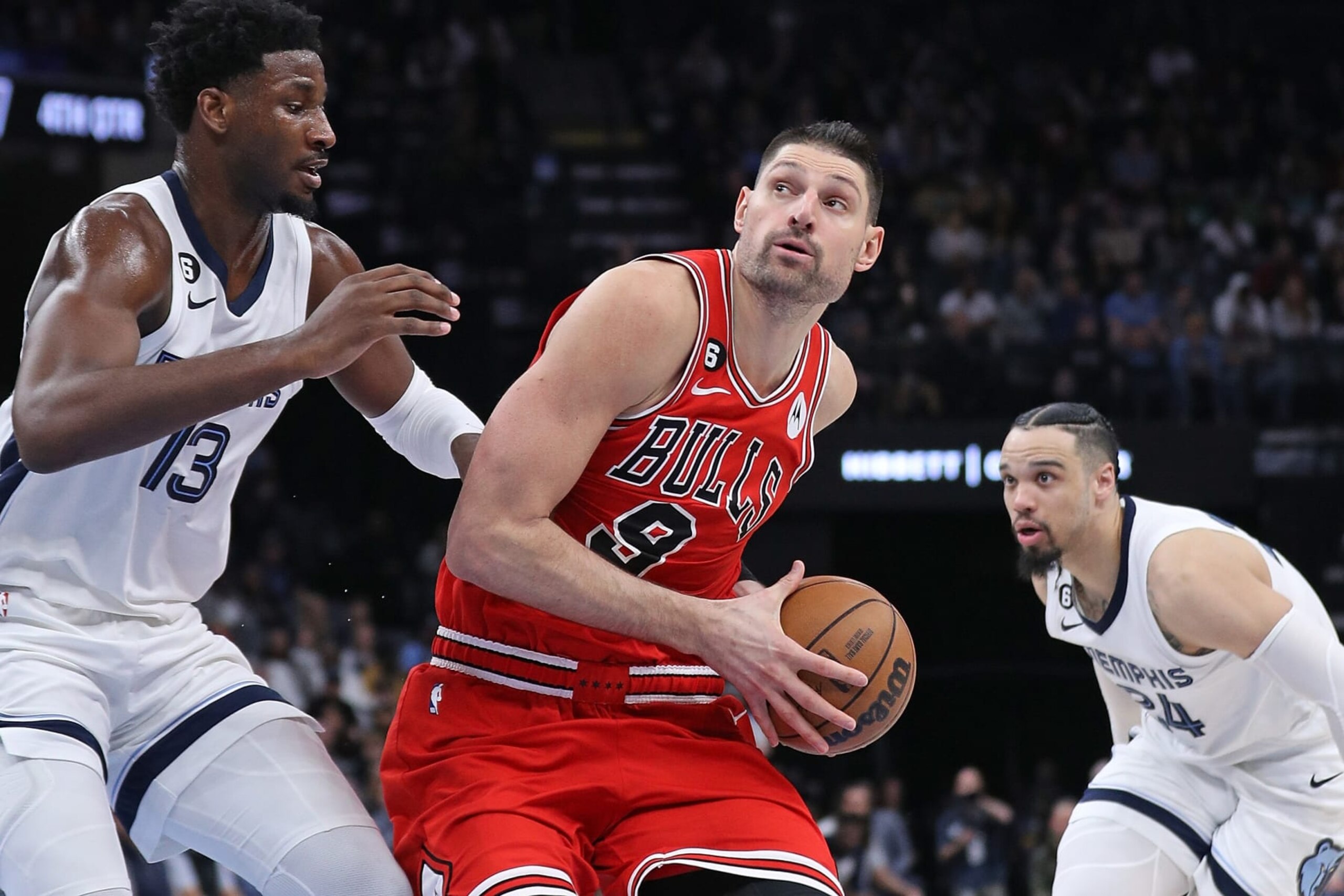 MEMPHIS, TENNESSEE - FEBRUARY 07: Nikola Vucevic #9 of the Chicago Bulls goes to the basket against Jaren Jackson Jr. #13 of the Memphis Grizzlies during the second half at FedExForum on February 07, 2023 in Memphis, Tennessee. NOTE TO USER: User expressly acknowledges and agrees that, by downloading and or using this photograph, User is consenting to the terms and conditions of the Getty Images License Agreement. (Photo by Justin Ford/Getty Images) MEMPHIS, TENNESSEE - FEBRUARY 07: Nikola Vucevic #9 of the Chicago Bulls goes to the basket against Jaren Jackson Jr. #13 of the Memphis Grizzlies during the second half at FedExForum on February 07, 2023 in Memphis, Tennessee. NOTE TO USER: User expressly acknowledges and agrees that, by downloading and or using this photograph, User is consenting to the terms and conditions of the Getty Images License Agreement. (Photo by Justin Ford/Getty Images)