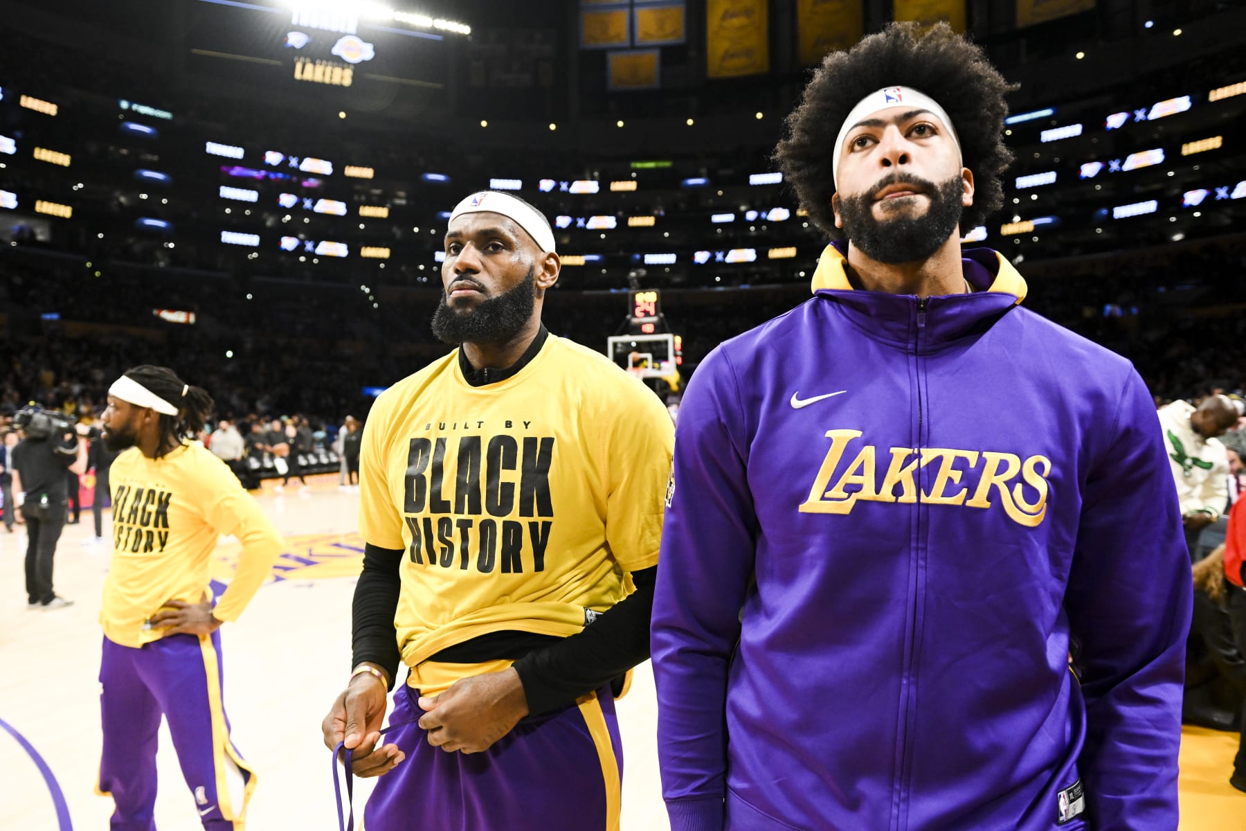 LOS ANGELES, CA - FEBRUARY 07: Los Angeles Lakers guard Patrick Beverley (left to right) stands with forward LeBron James (6) and forward Anthony Davis (3) before the game against the Oklahoma City Thunder at Crypto.com Arena on Tuesday, Feb. 7, 2023 in Los Angeles, CA.(Wally Skalij / Los Angeles Times via Getty Images)