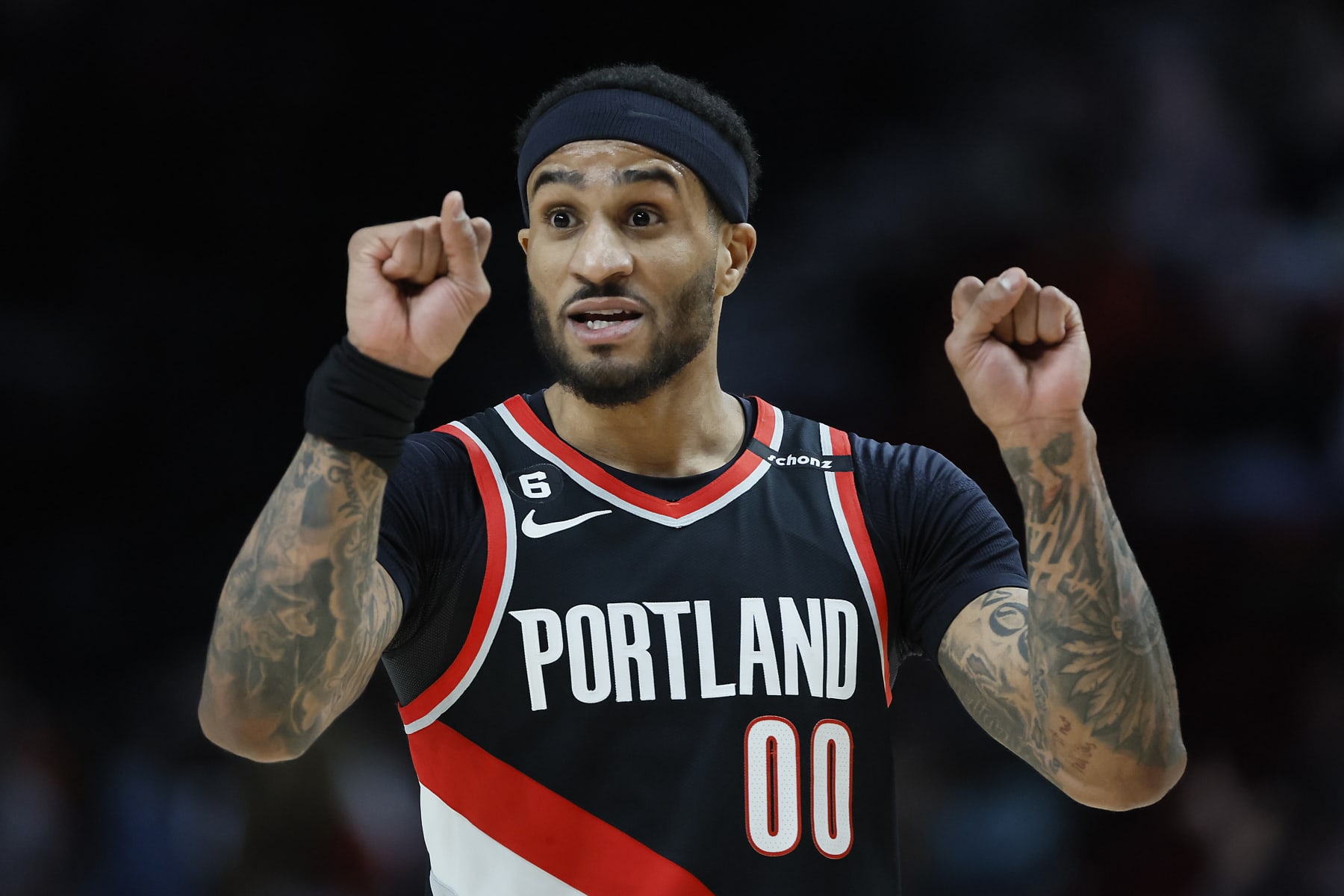 PORTLAND, OREGON - JANUARY 30: Gary Payton II #00 of the Portland Trail Blazers gestures during the first half against the Atlanta Hawks at Moda Center on January 30, 2023 in Portland, Oregon. NOTE TO USER: User expressly acknowledges and agrees that, by downloading and or using this photograph, User is consenting to the terms and conditions of the Getty Images License Agreement.  (Photo by Soobum Im/Getty Images)