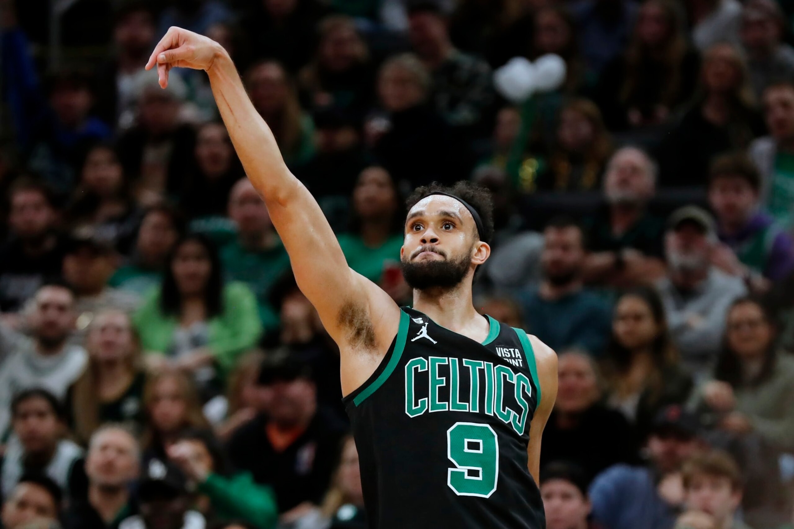 Boston Celtics' Derrick White watches his 3-pointer during the first half of an NBA basketball game against the Charlotte Hornets, Friday, Feb. 10, 2023, in Boston. (AP Photo/Michael Dwyer) Boston Celtics' Derrick White watches his 3-pointer during the first half of an NBA basketball game against the Charlotte Hornets, Friday, Feb. 10, 2023, in Boston. (AP Photo/Michael Dwyer)