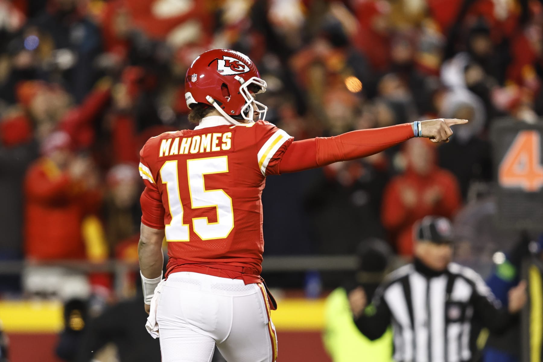 KANSAS CITY, MISSOURI - JANUARY 29: Patrick Mahomes #15 of the Kansas City Chiefs celebrates after passing for a touchdown during the AFC Championship NFL football game between the Kansas City Chiefs and the Cincinnati Bengals at GEHA Field at Arrowhead Stadium on January 29, 2023 in Kansas City, Missouri. (Photo by Michael Owens/Getty Images)