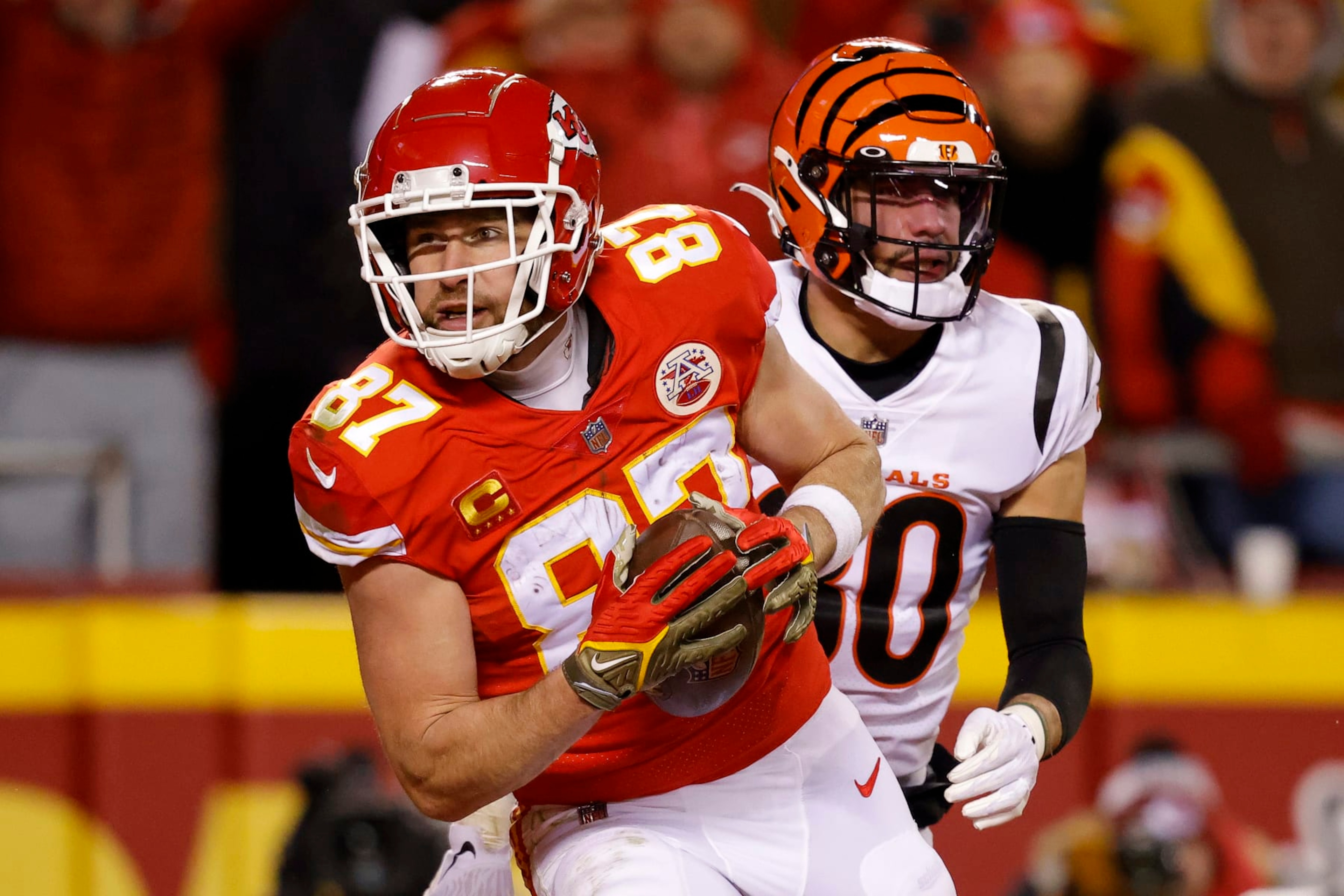 KANSAS CITY, MISSOURI - JANUARY 29: Travis Kelce #87 of the Kansas City Chiefs catches a pass for a touchdown against the Cincinnati Bengals during the second quarter in the AFC Championship Game at GEHA Field at Arrowhead Stadium on January 29, 2023 in Kansas City, Missouri. (Photo by David Eulitt/Getty Images)